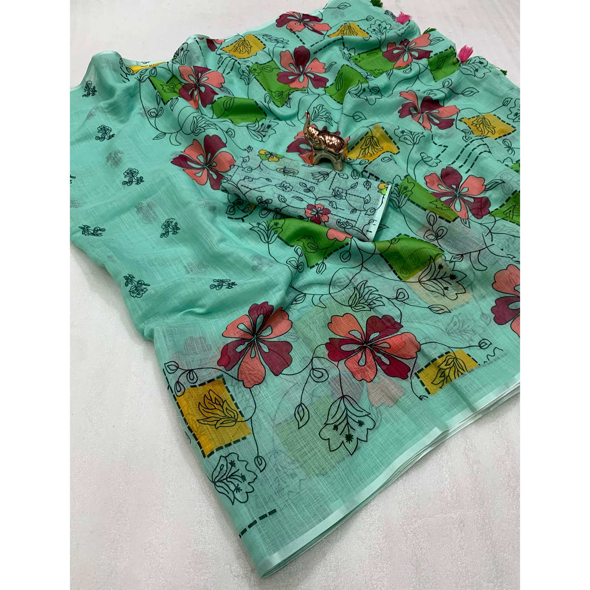 Turquoise Floral Printed Linen Saree With Elegant Tassel Border