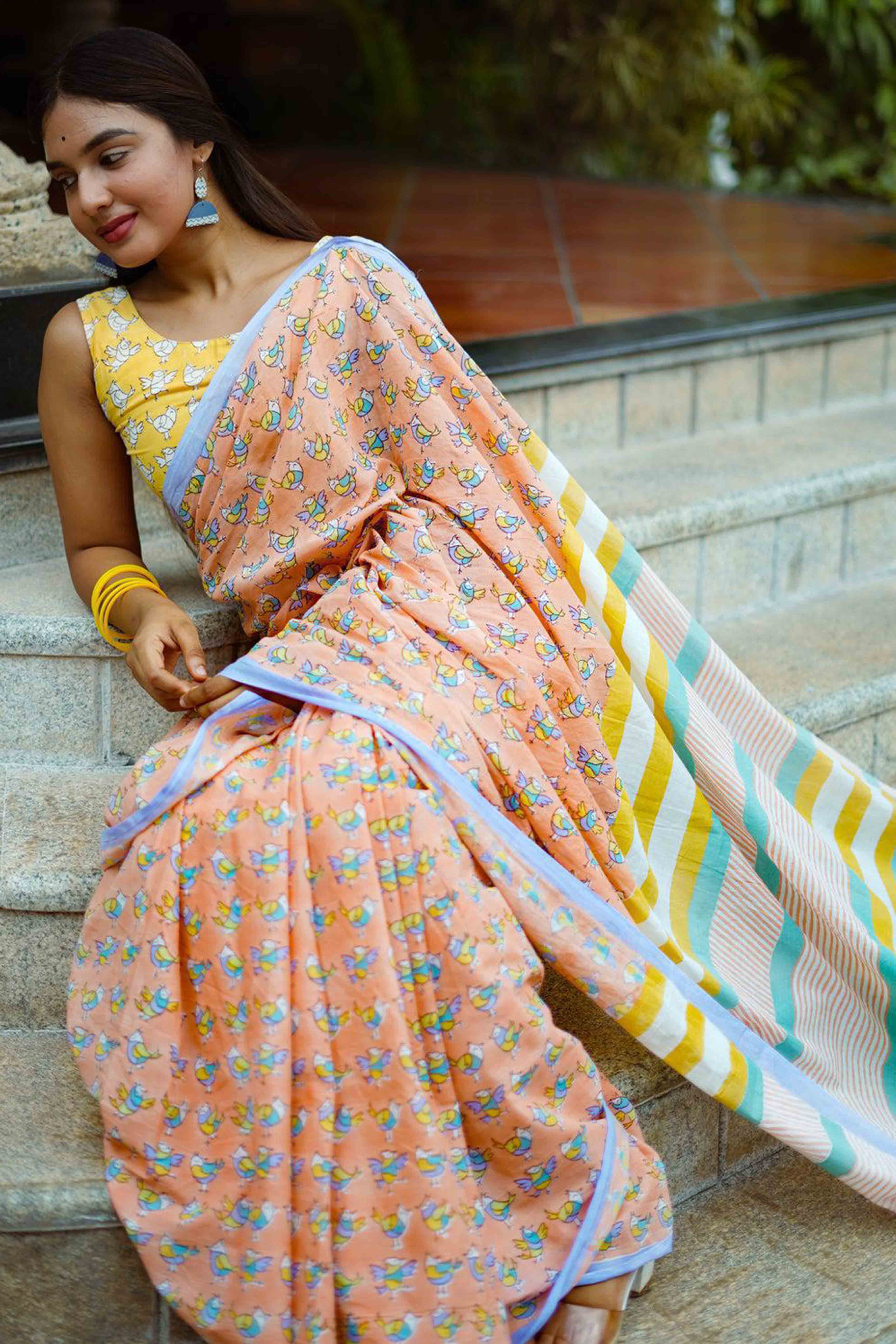 Light Orange Batik Printed Pure Linen Saree With Tassels