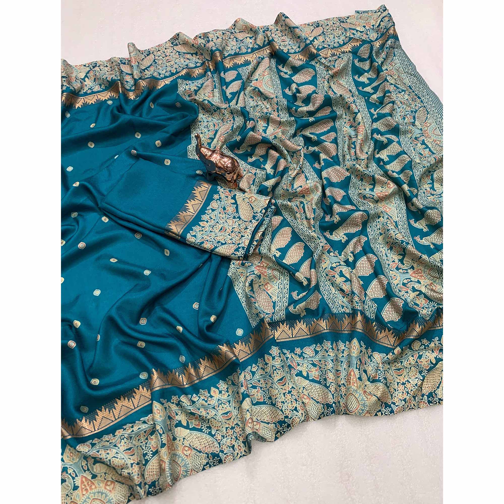 Teal Cotton Silk Saree with Zari-Woven Border and Artistic Printed Details