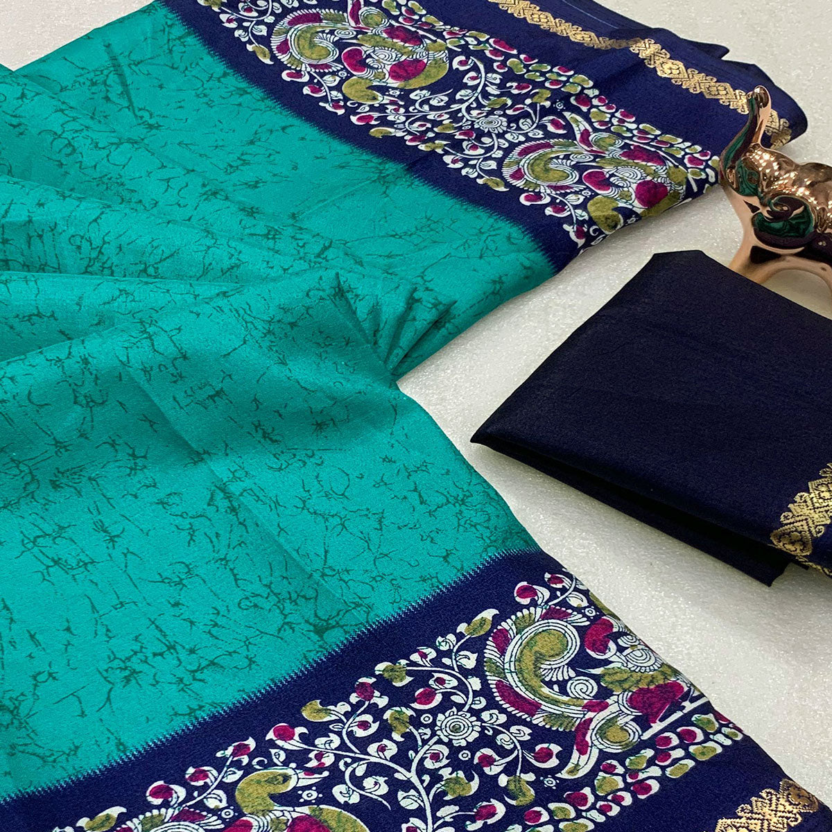 Turquoise Dola Silk Saree with Artistic Abstract Prints and Kalamkari Pallu