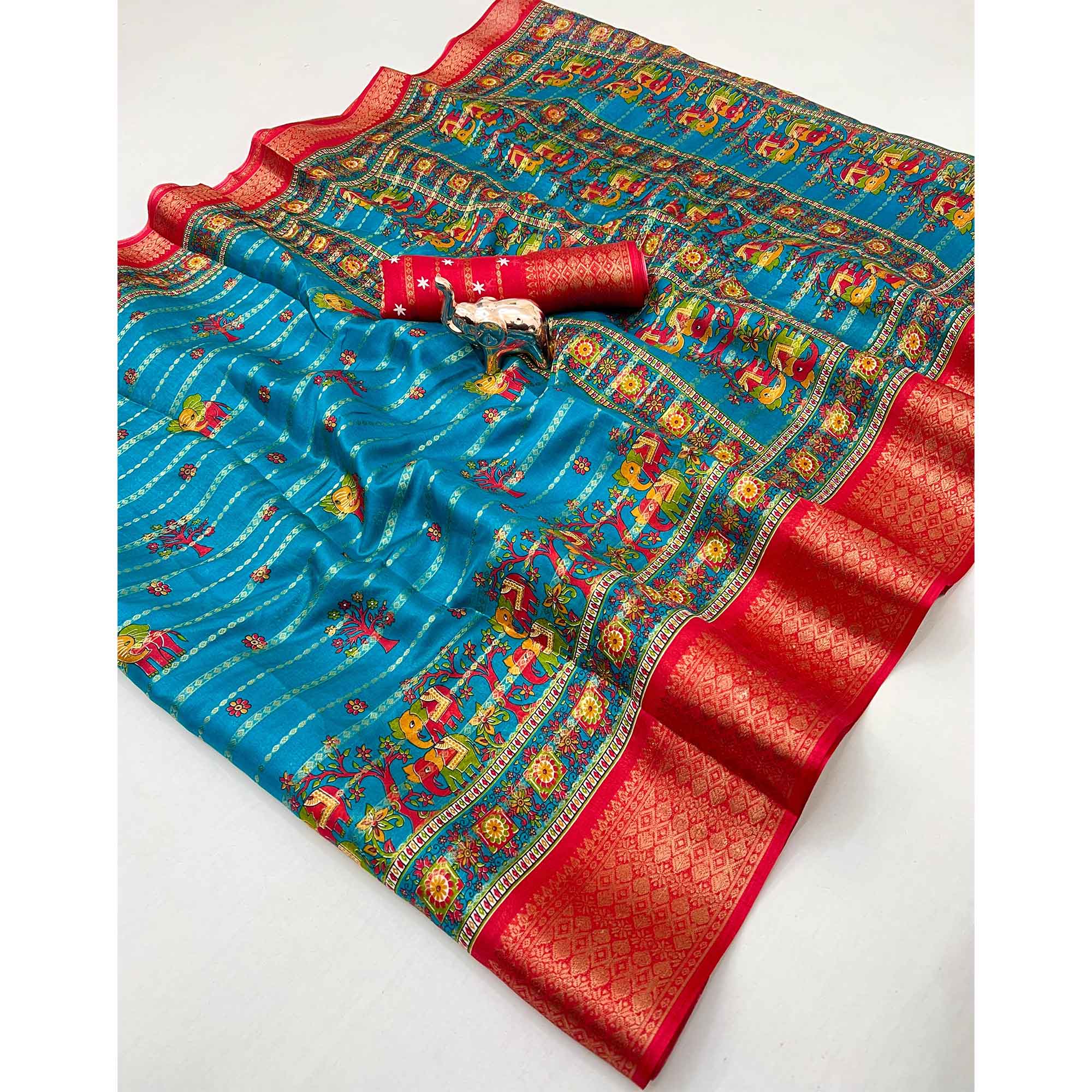 Regal Blue Weaving Dola Silk Saree Adorned With Artistic Elephant & Floral Print