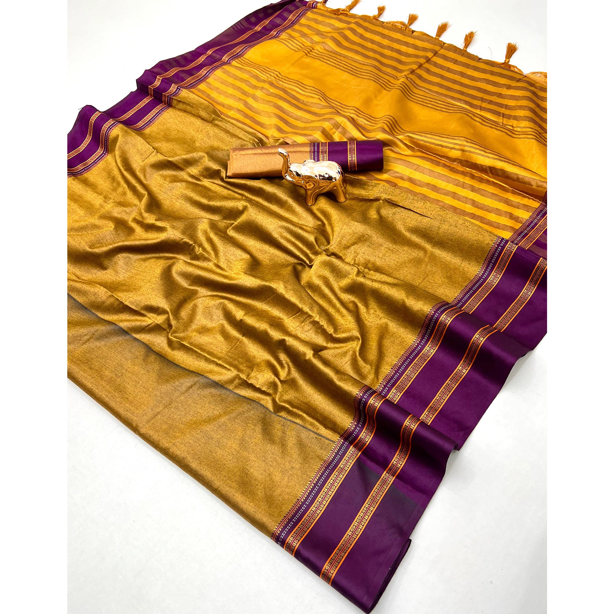 Classic Mustard Solid Weaving Pure Silk Saree Accented With Woven Striped Pallu & Tassel Finish