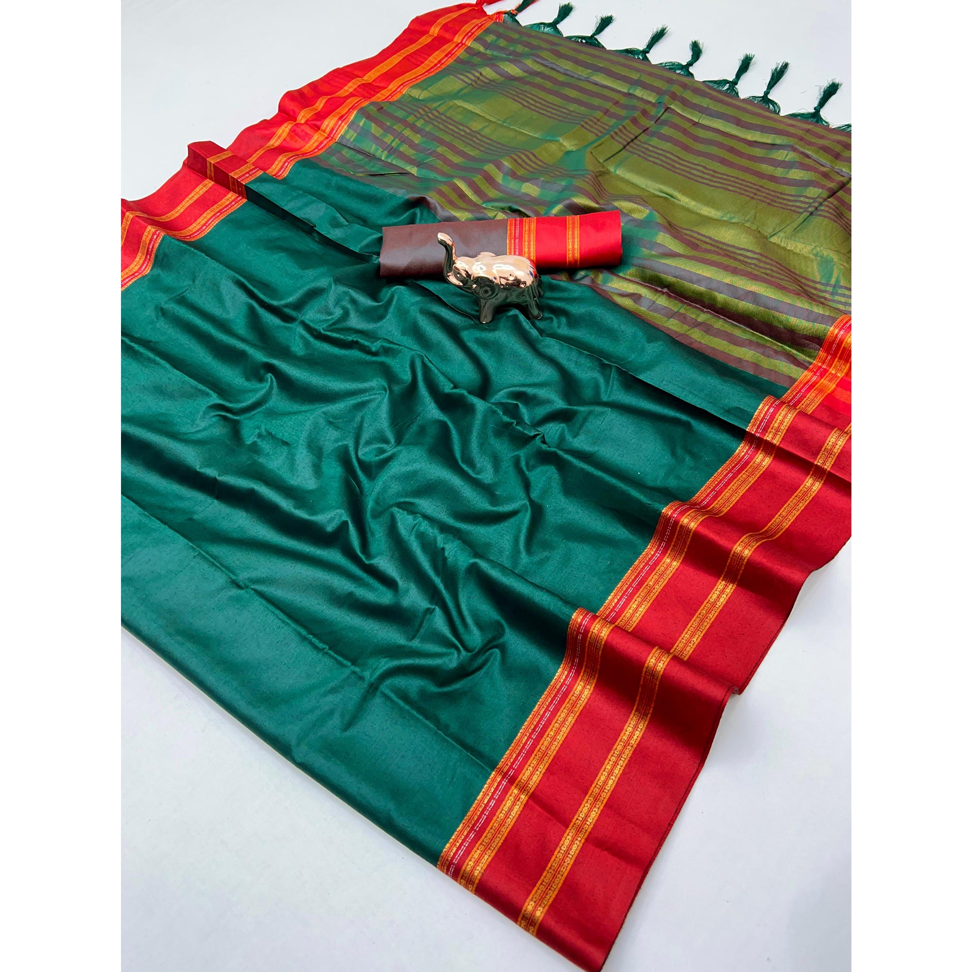Classic Rama Green Solid Weaving Pure Silk Saree Accented With Woven Striped Pallu & Tassel Finish
