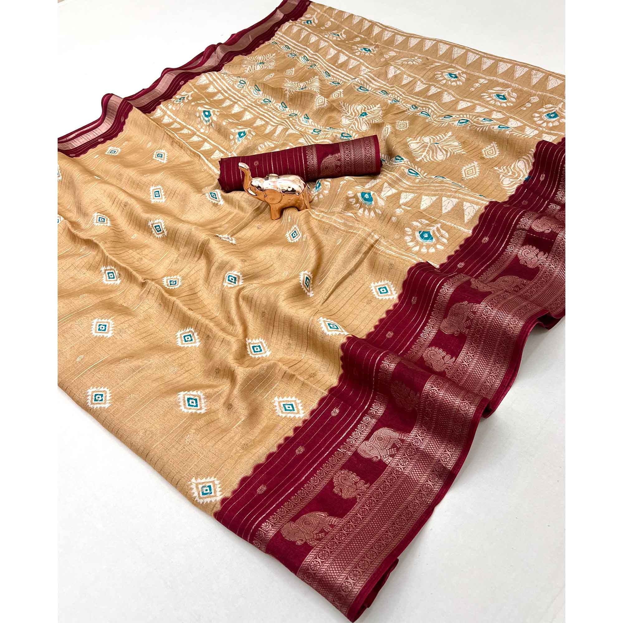 Charming Chikoo Printed Cotton Silk Saree With Elephant & Peacock Design Weaving Border