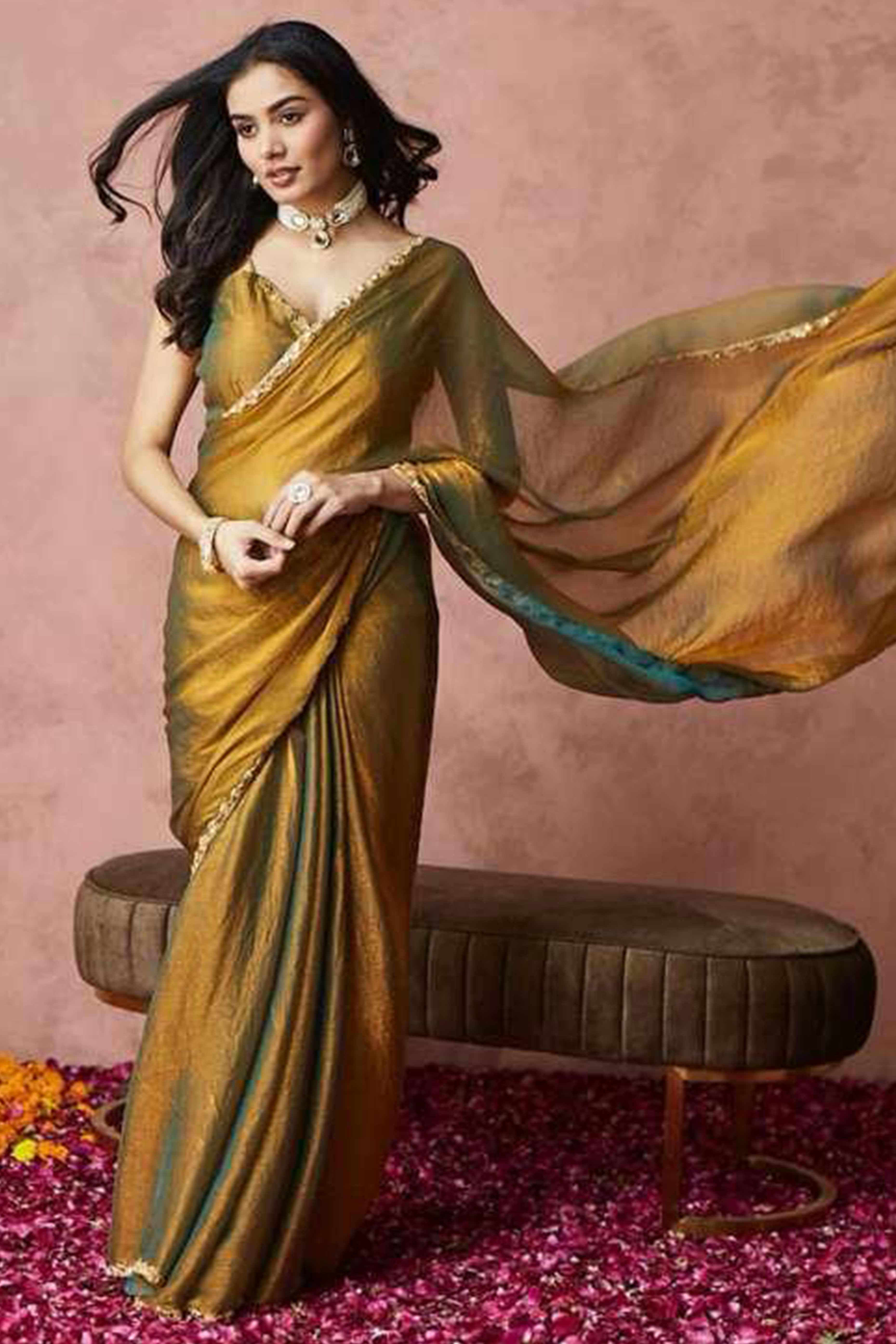 Shimmering Metallic Gold Chiffon Solid Saree With Stone Detailing