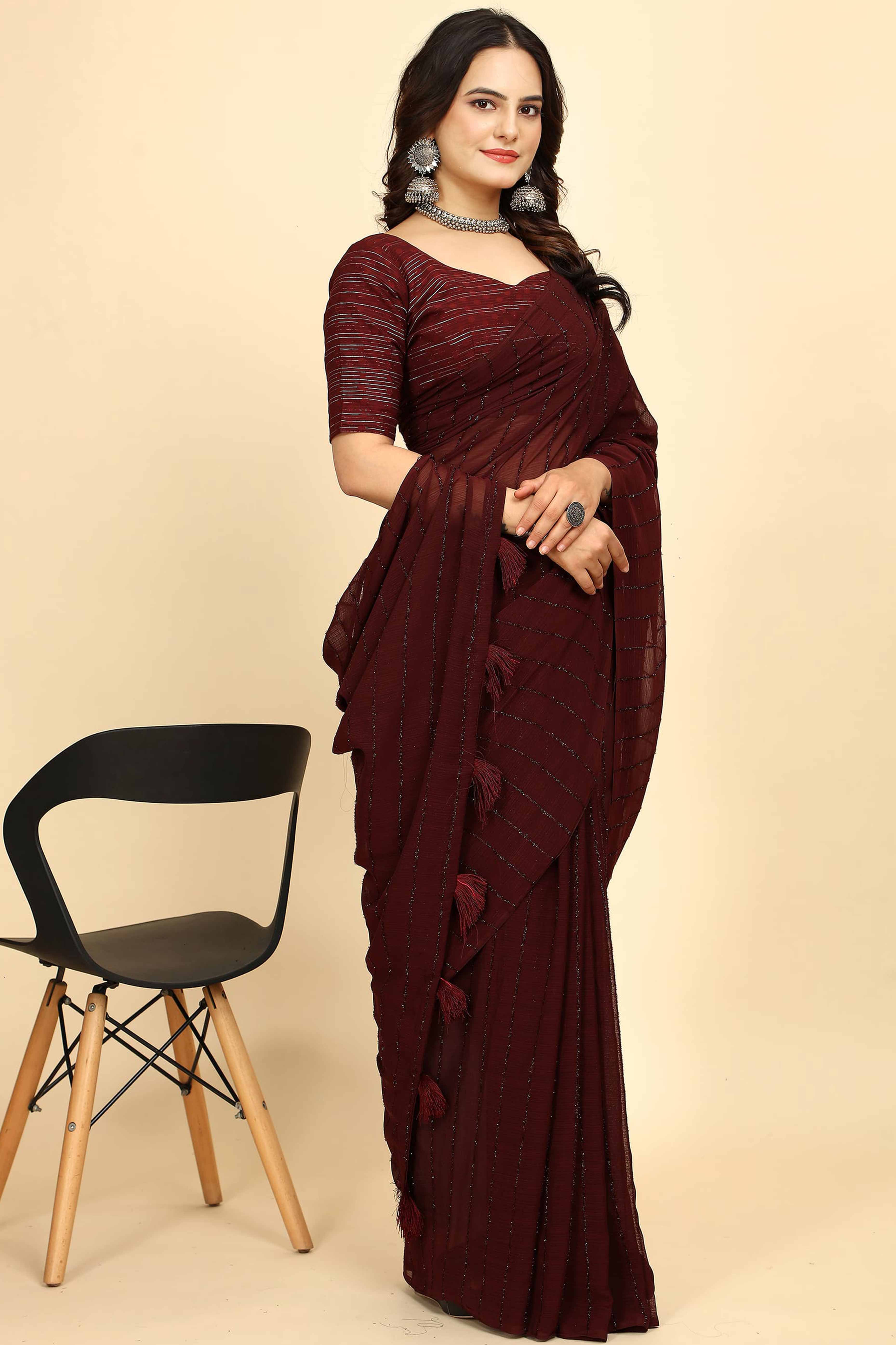 Dark Maroon Striped Zari Woven Chiffon Saree With Tassels