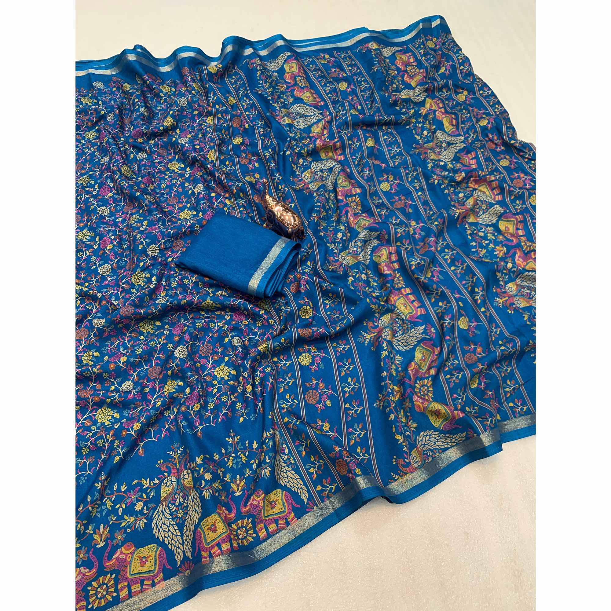 Blue Floral Printed Tussar Silk Blend Saree Accentuated With Rich Zari Border Work