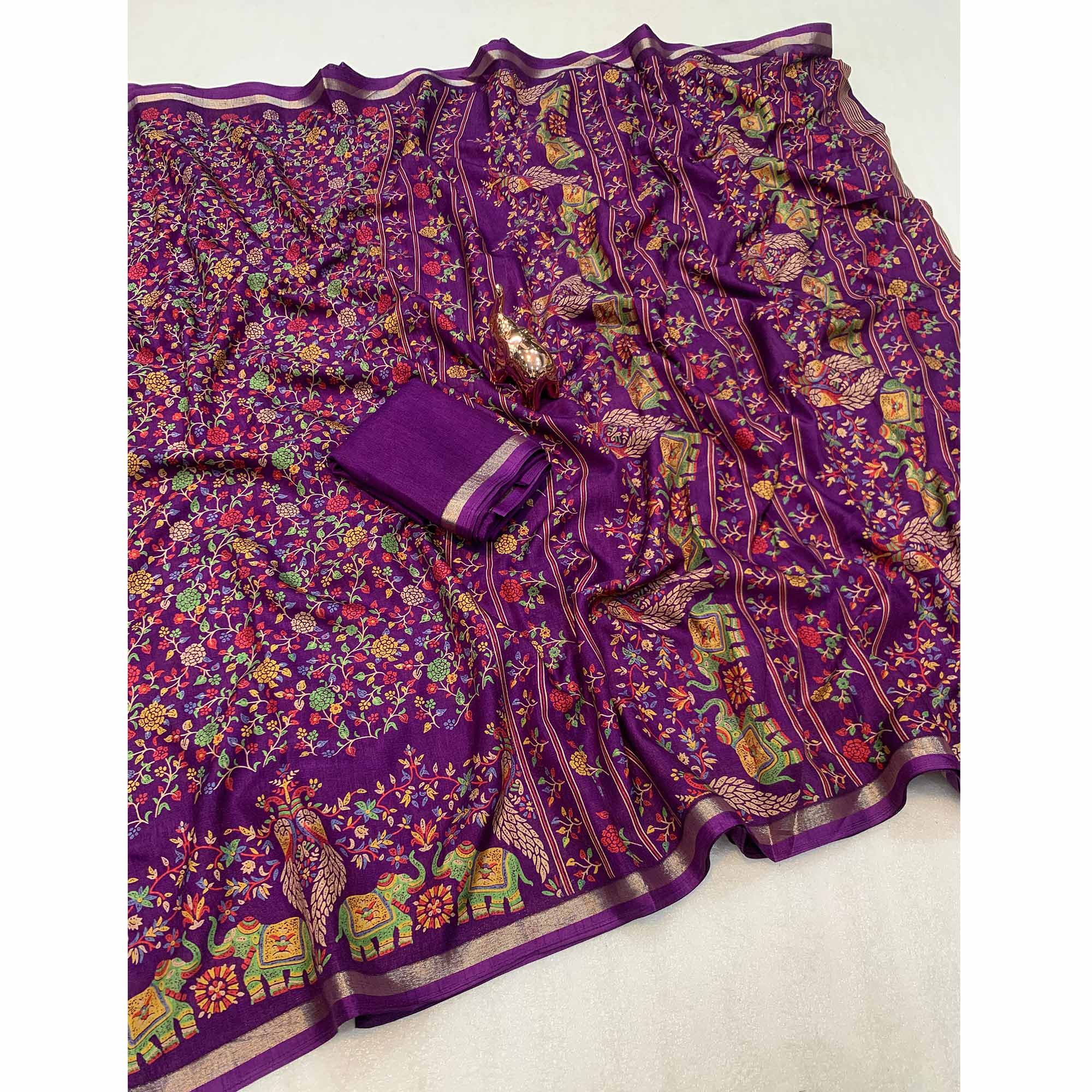 Purple Floral Printed Tussar Silk Blend Saree Accentuated With Rich Zari Border Work