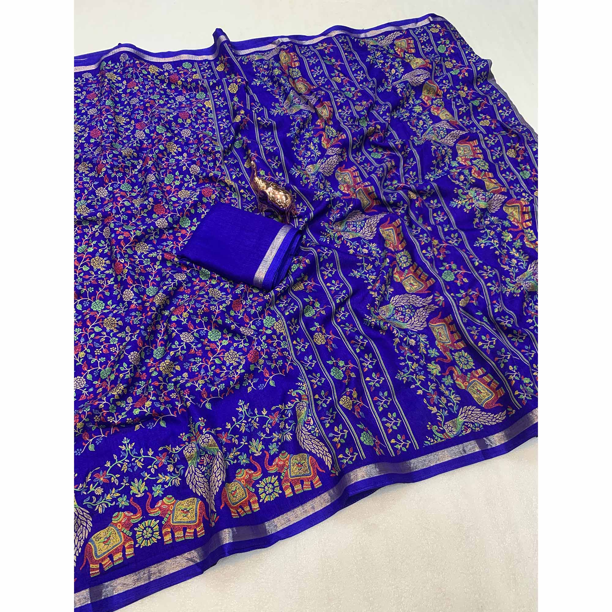 Royal Blue Floral Printed Tussar Silk Blend Saree Accentuated With Rich Zari Border Work
