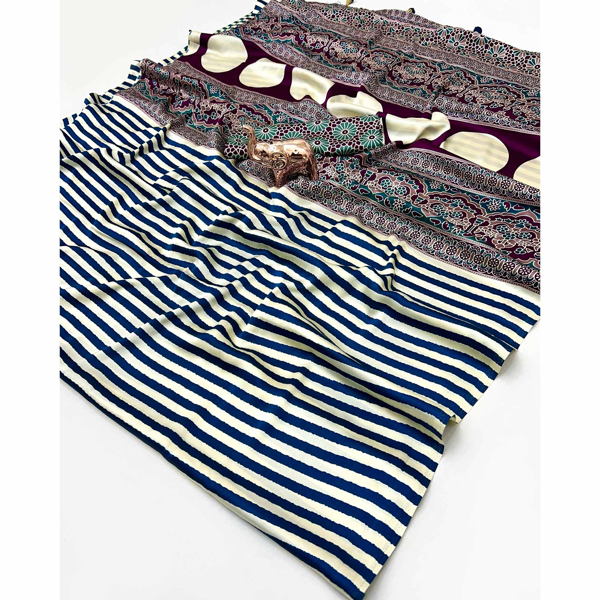 Luxe Partywear Saree in Blue Satin with Modern Striped Print and Flowing Drape