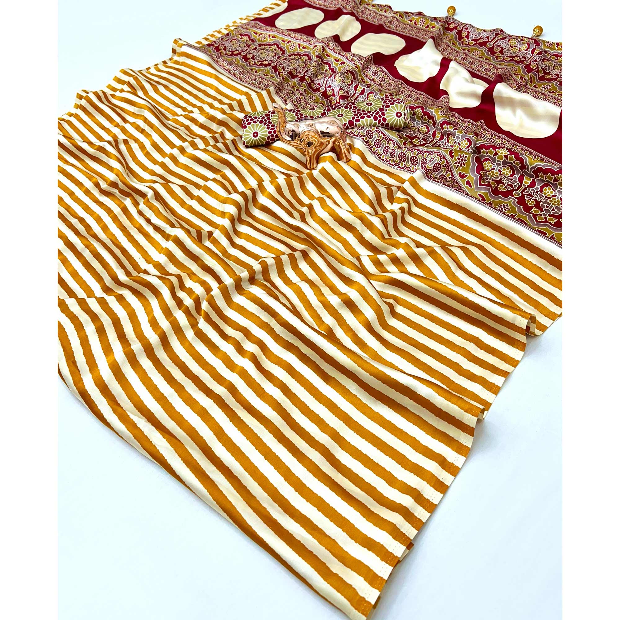 Luxe Partywear Saree in Mustard Satin with Modern Striped Print and Flowing Drape