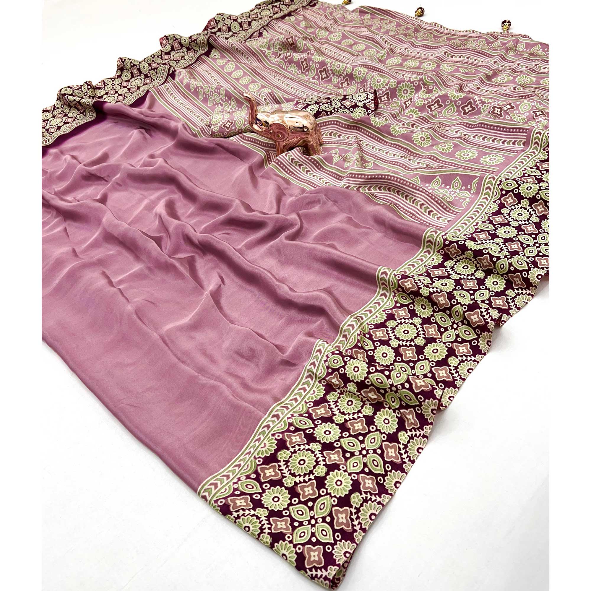 Dusty Rose Pink Solid Satin Saree Featuring Bold Ajrakh Print and Tassel Accented Pallu
