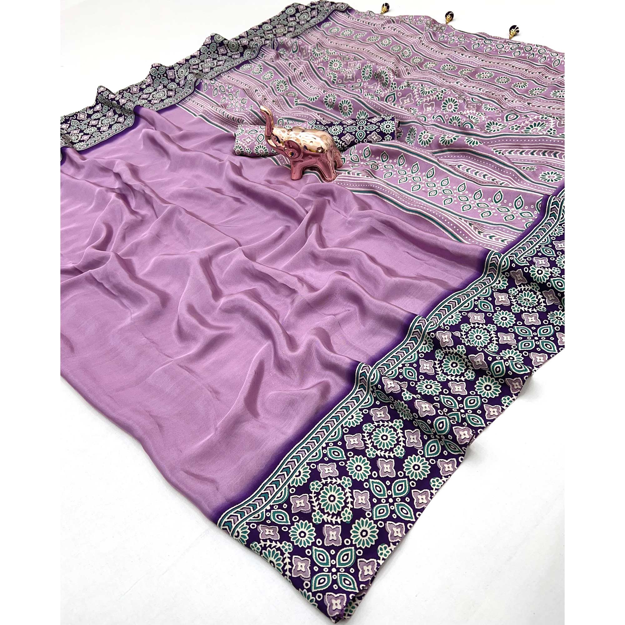 Lavender Solid Satin Saree Featuring Bold Ajrakh Print and Tassel Accented Pallu