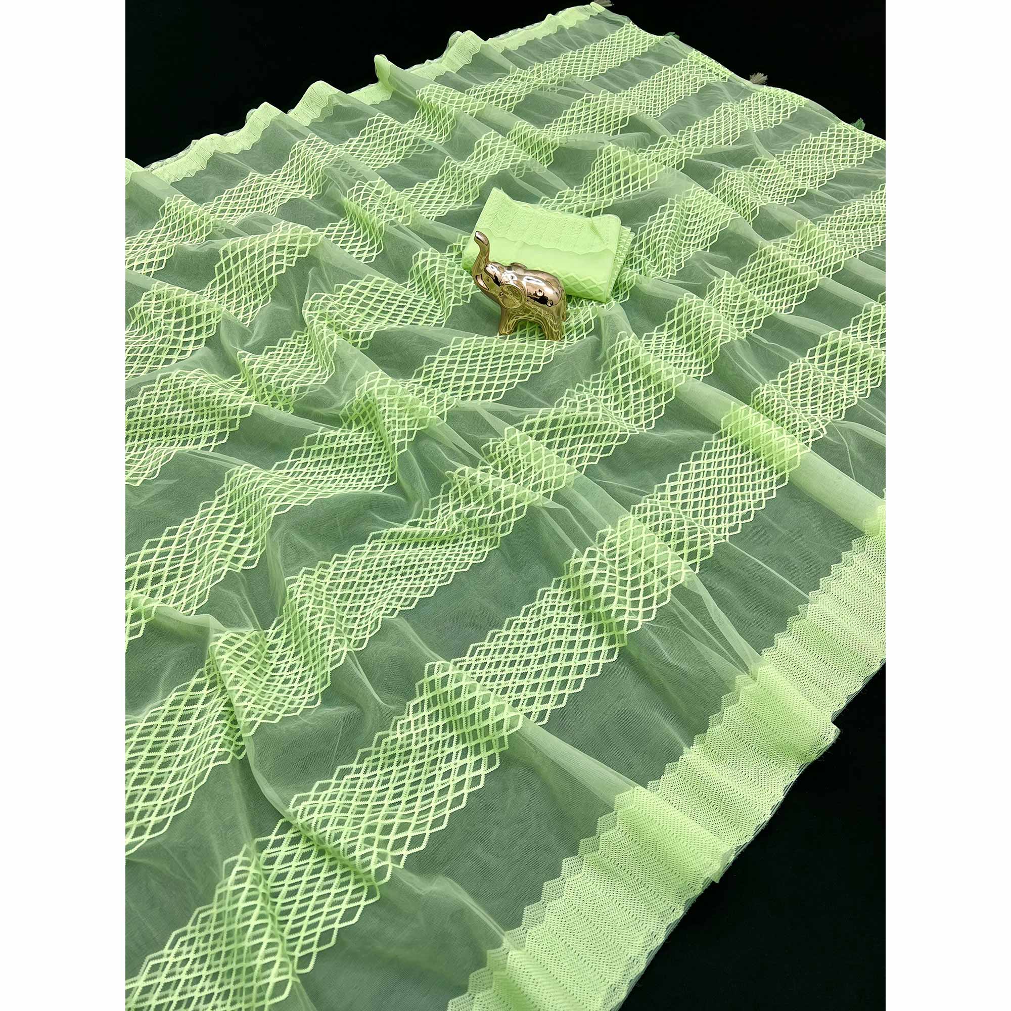 Green Woven Thread Work Net Saree With Tassels