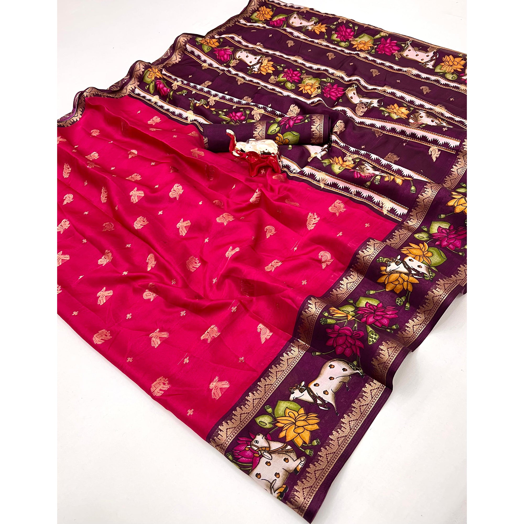 Elegant Pink Peacock Pattern Zari Weaving Georgette Saree With Tassel Pallu