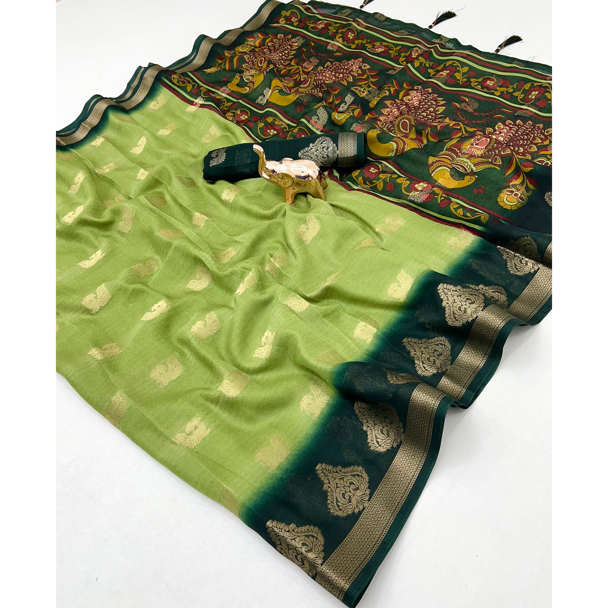 Elegant Green Peacock Pattern Zari Weaving Georgette Saree With Tassel Pallu