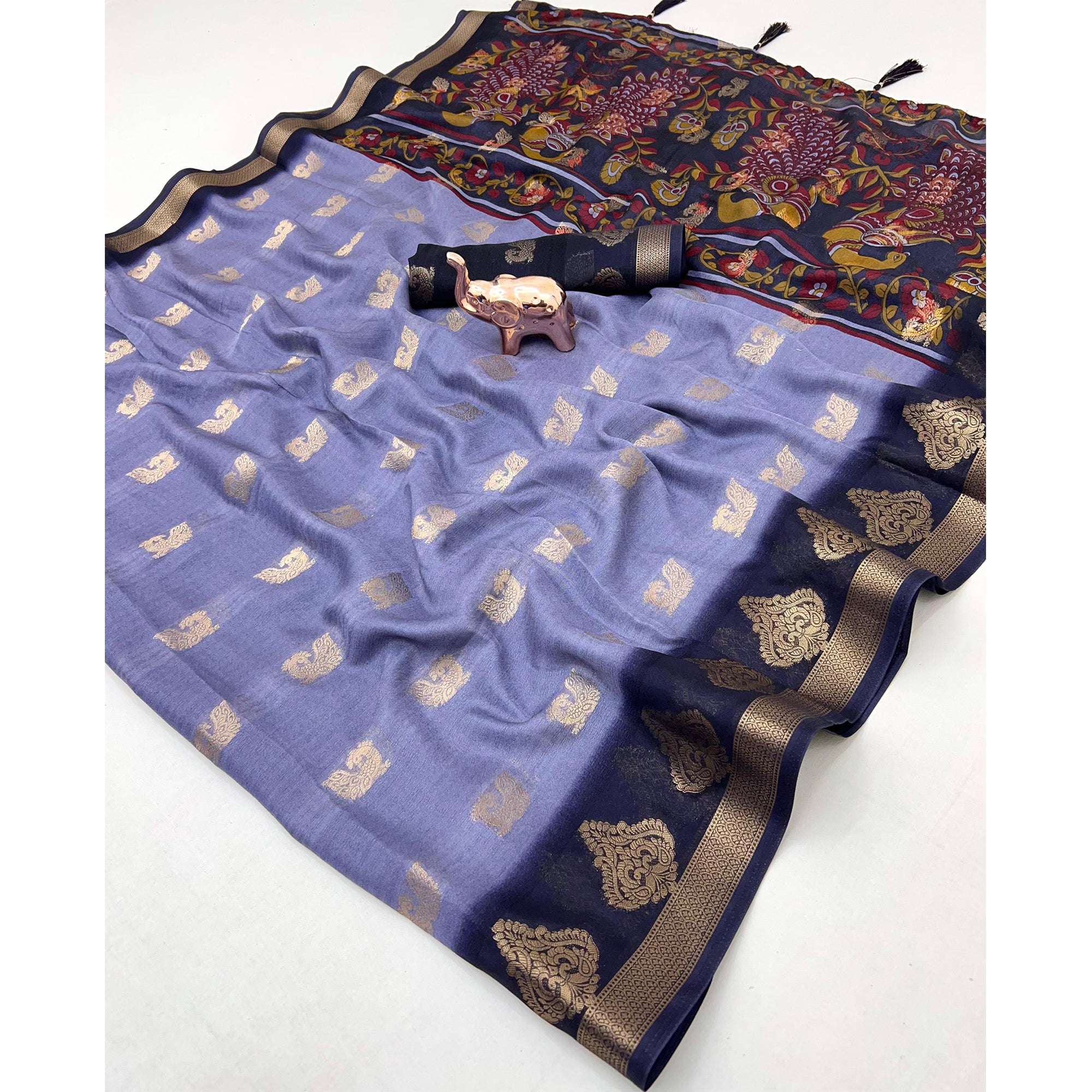 Elegant Lavender Peacock Pattern Zari Weaving Georgette Saree With Tassel Pallu