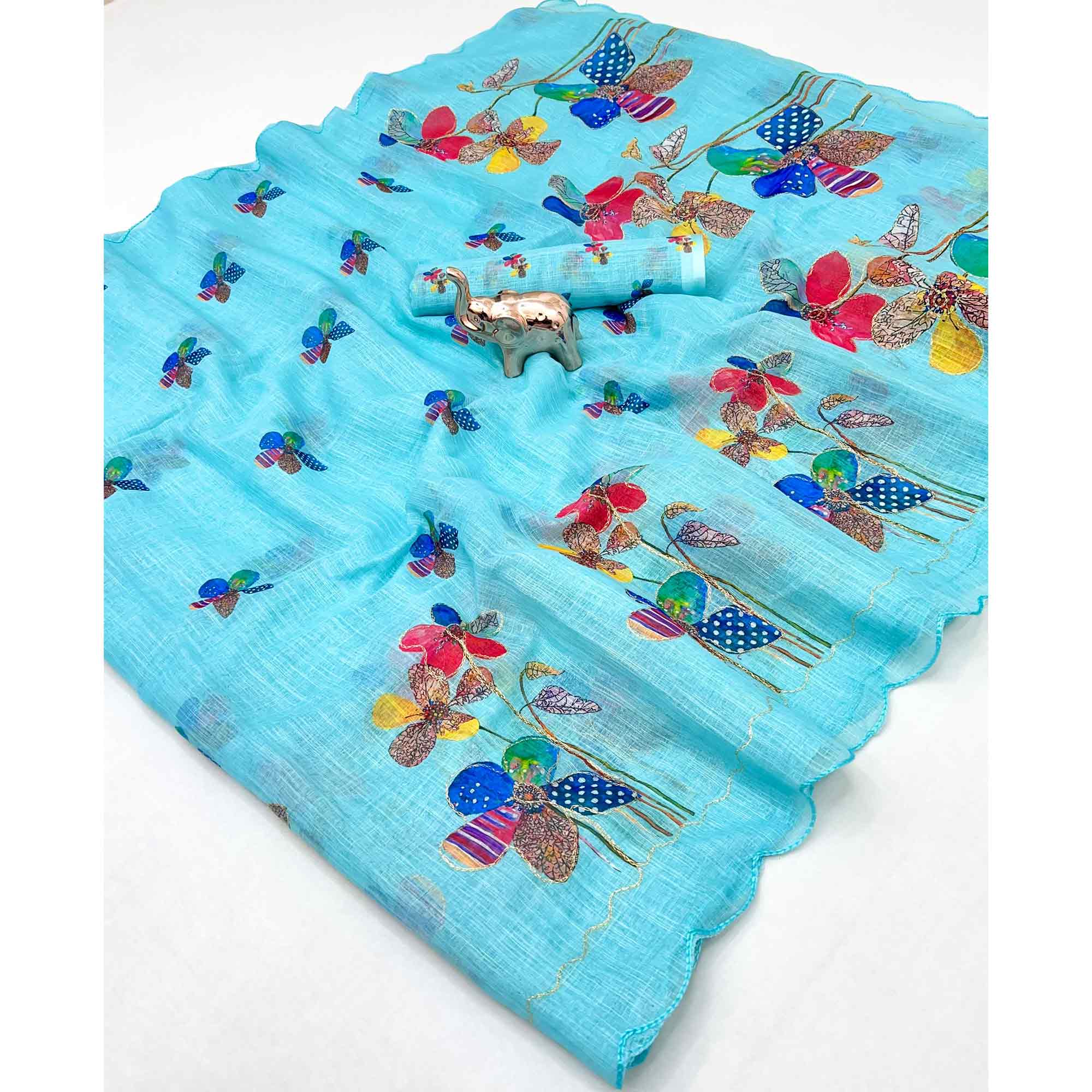 Blue Linen Saree Featuring Floral Digital Print With Zari Outline & Cutwork Border
