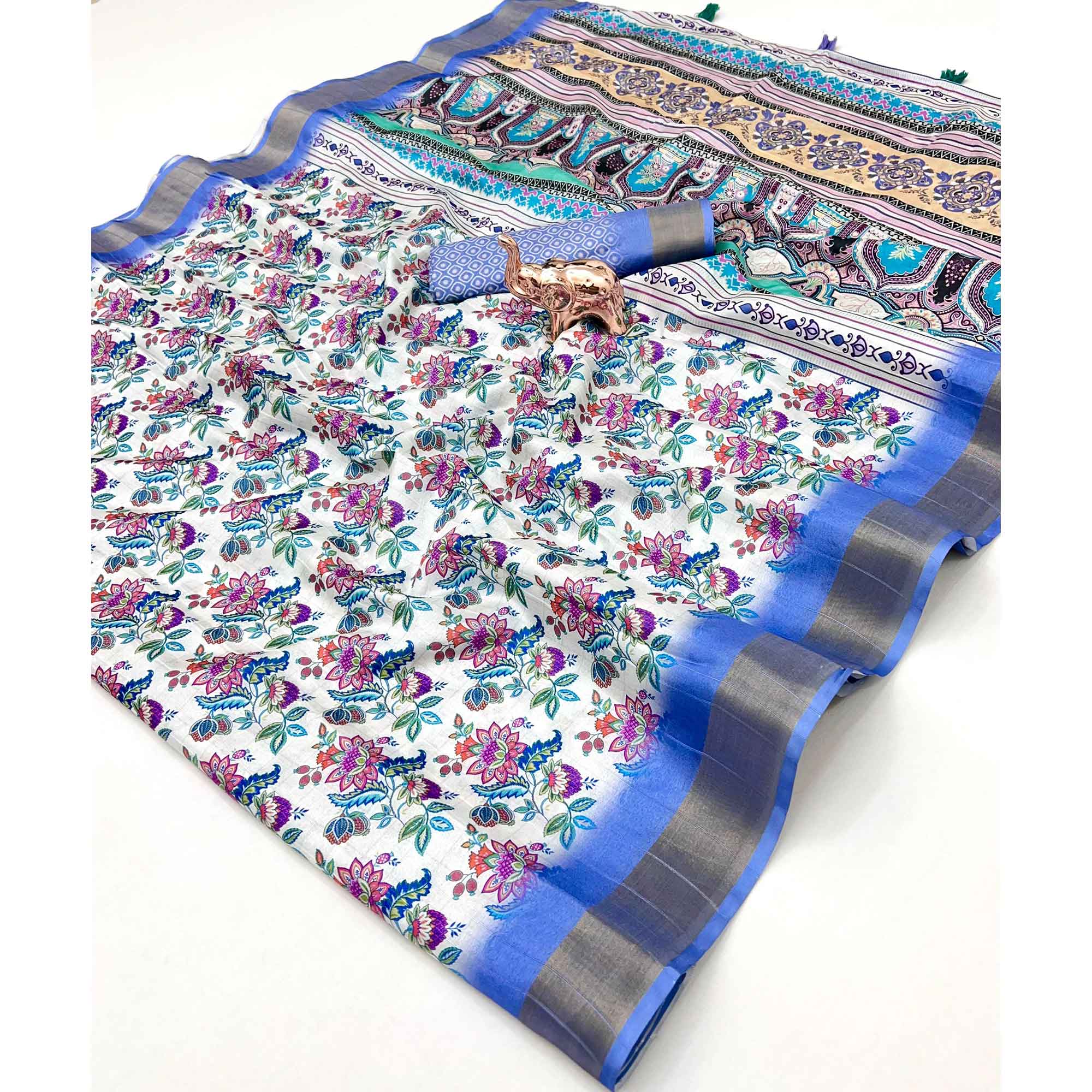 Festive White & Blue Silk Blend Saree with Subtle Floral Print and Shimmering Zari Border