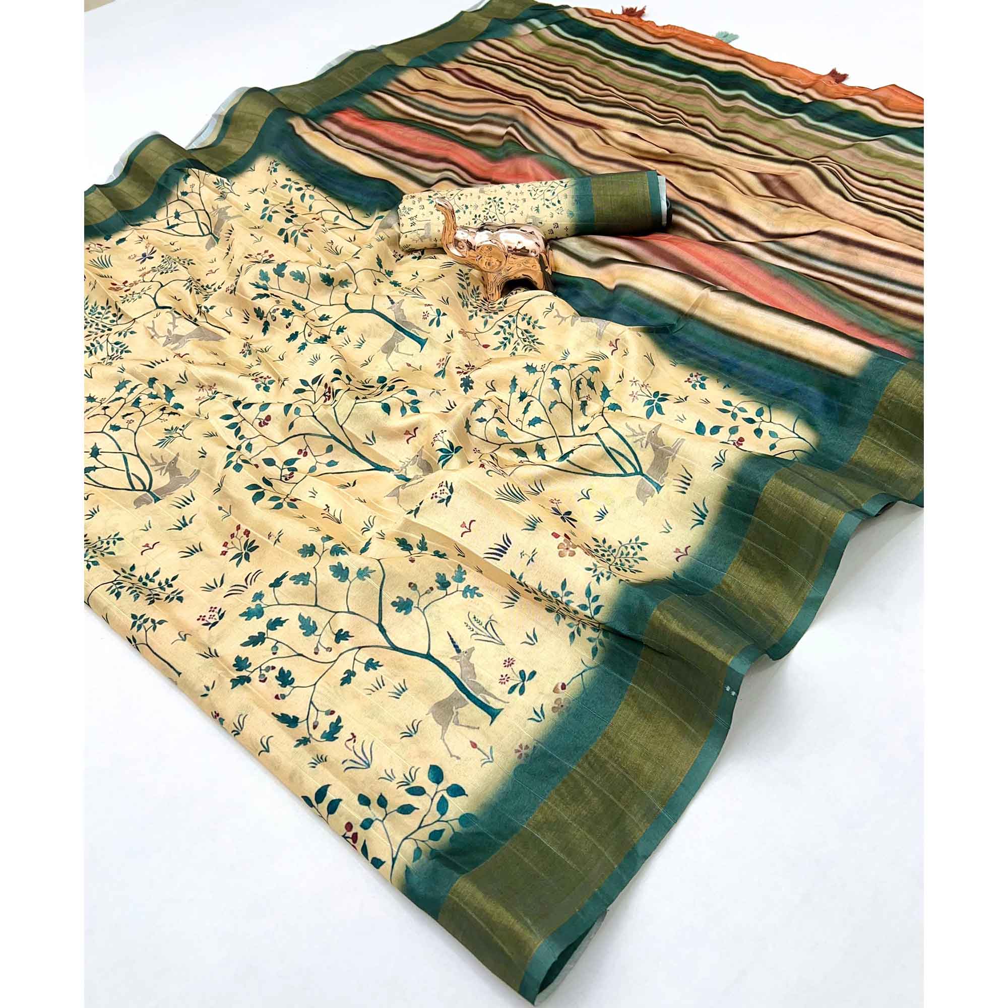 Festive Cream Silk Blend Saree with Subtle Floral Print and Shimmering Zari Border
