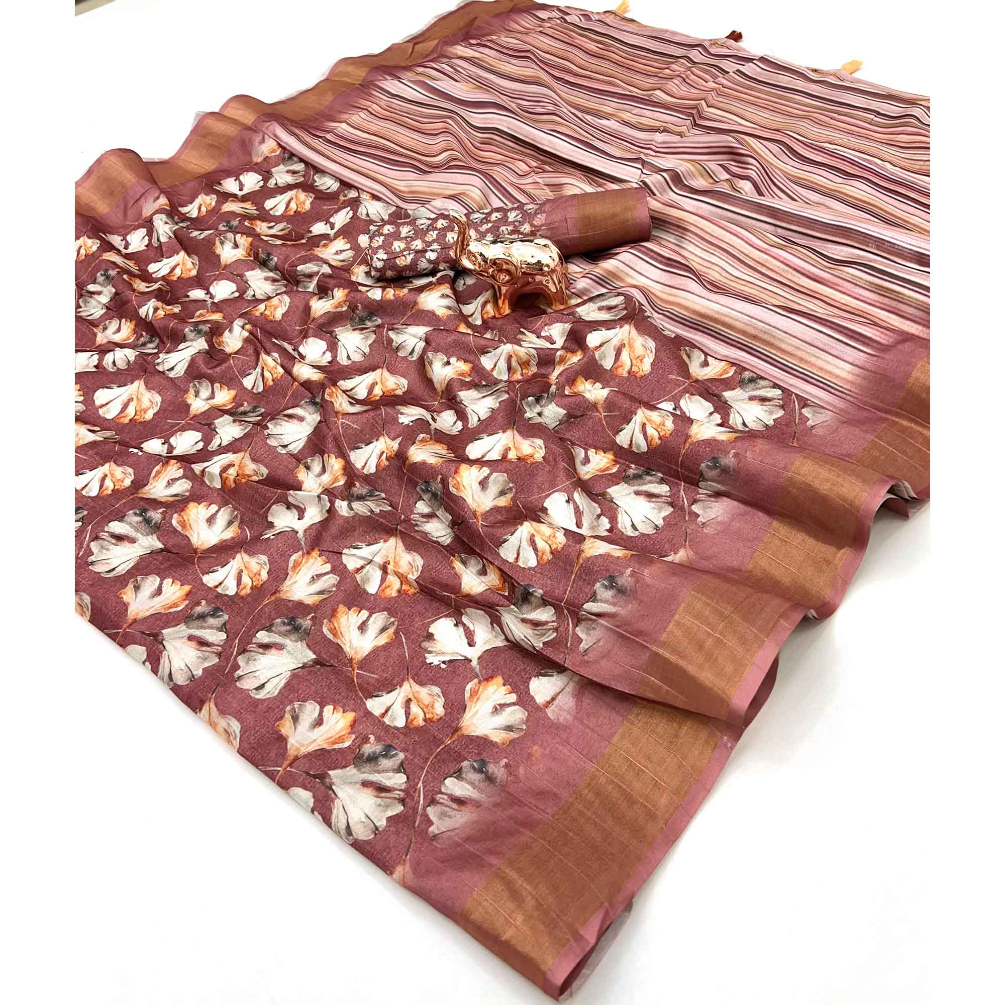 Festive Mauve Silk Blend Saree with Subtle Floral Print and Shimmering Zari Border
