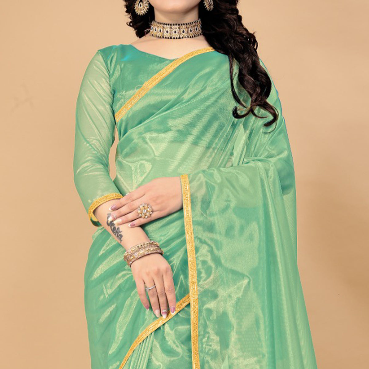 Sea Green Solid Nylon Saree With Lace Border