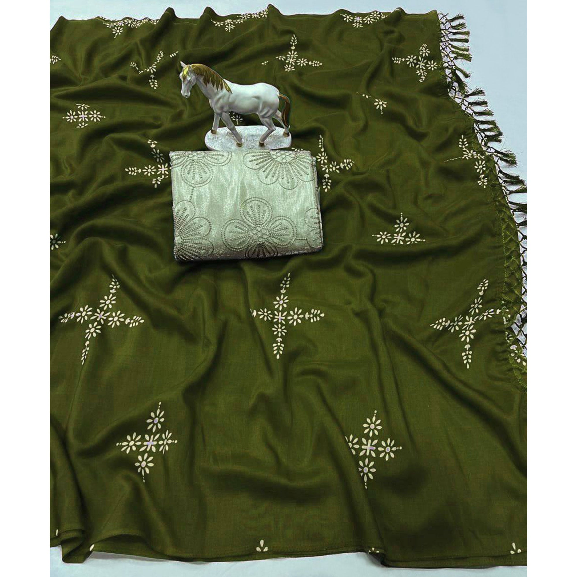 Mehendi Green Muslin Cotton Silk Saree Adorned With Delicate Floral Prints & Playful Tassels