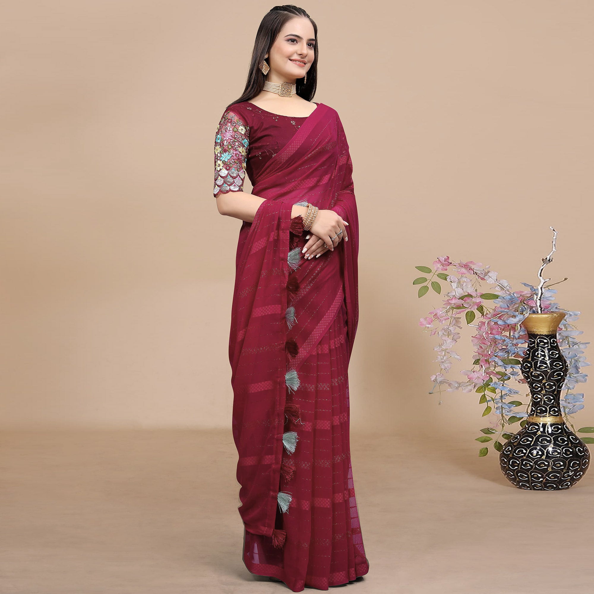 Maroon Woven Georgette Saree With Tassels