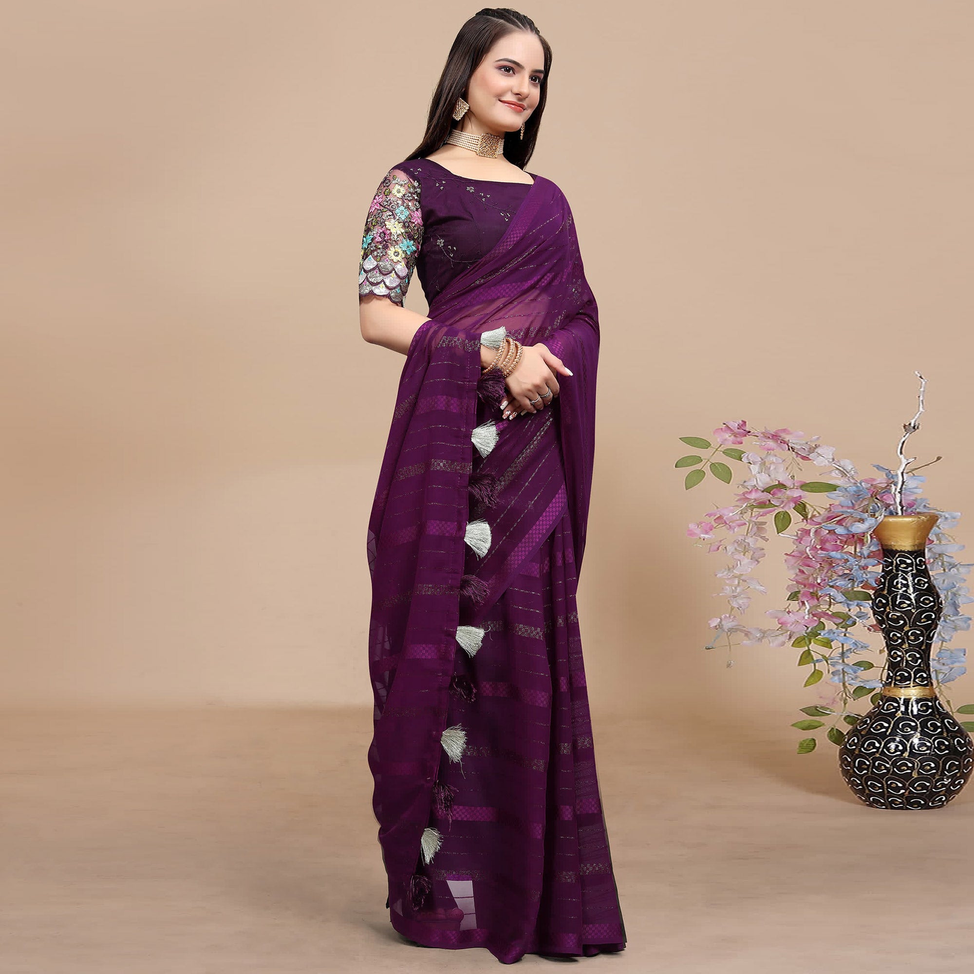 Wine Woven Georgette Saree With Tassels