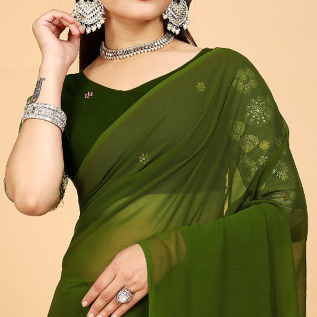 Green Solid Georgette Saree With Tassels