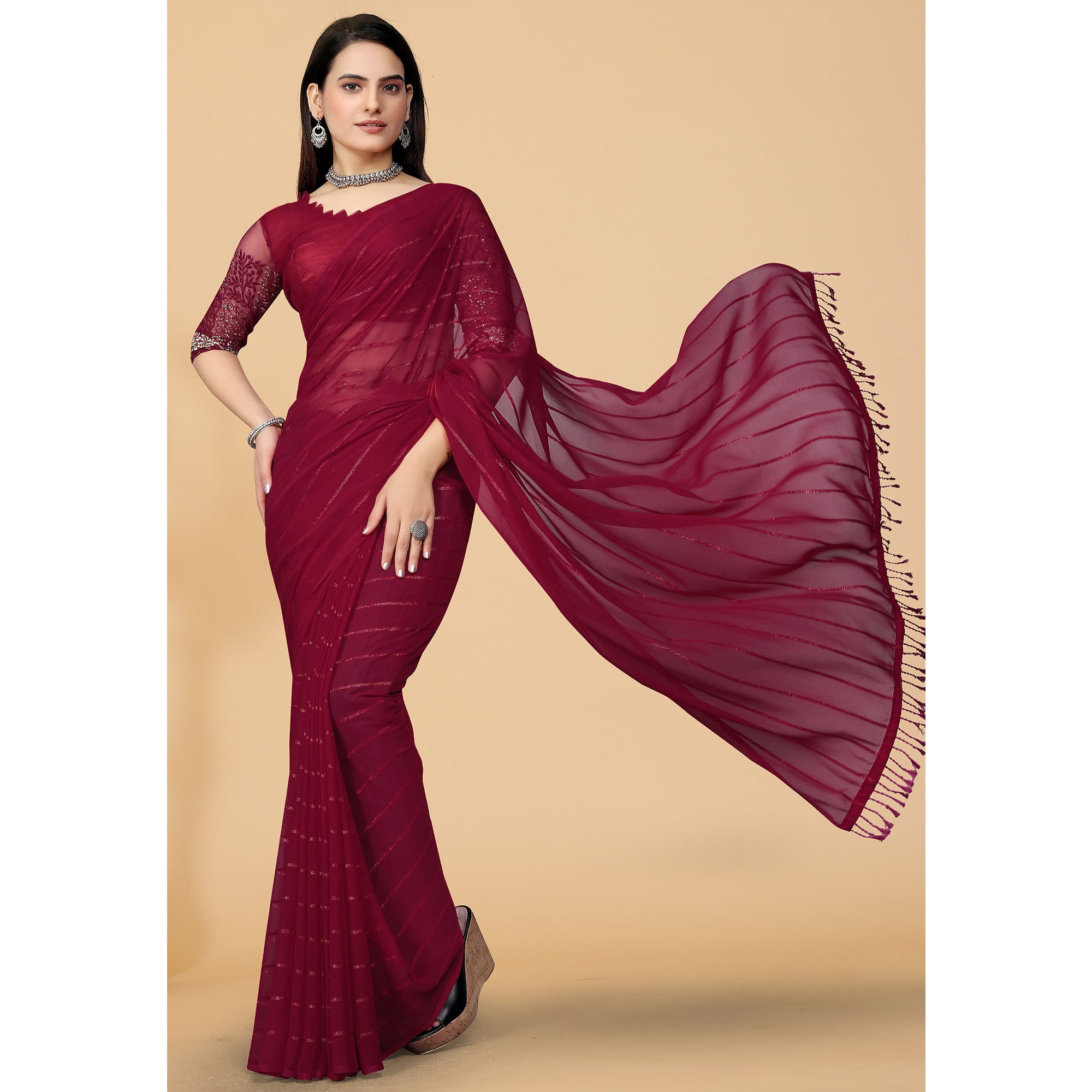 Maroon Woven Georgette Saree with Tassels