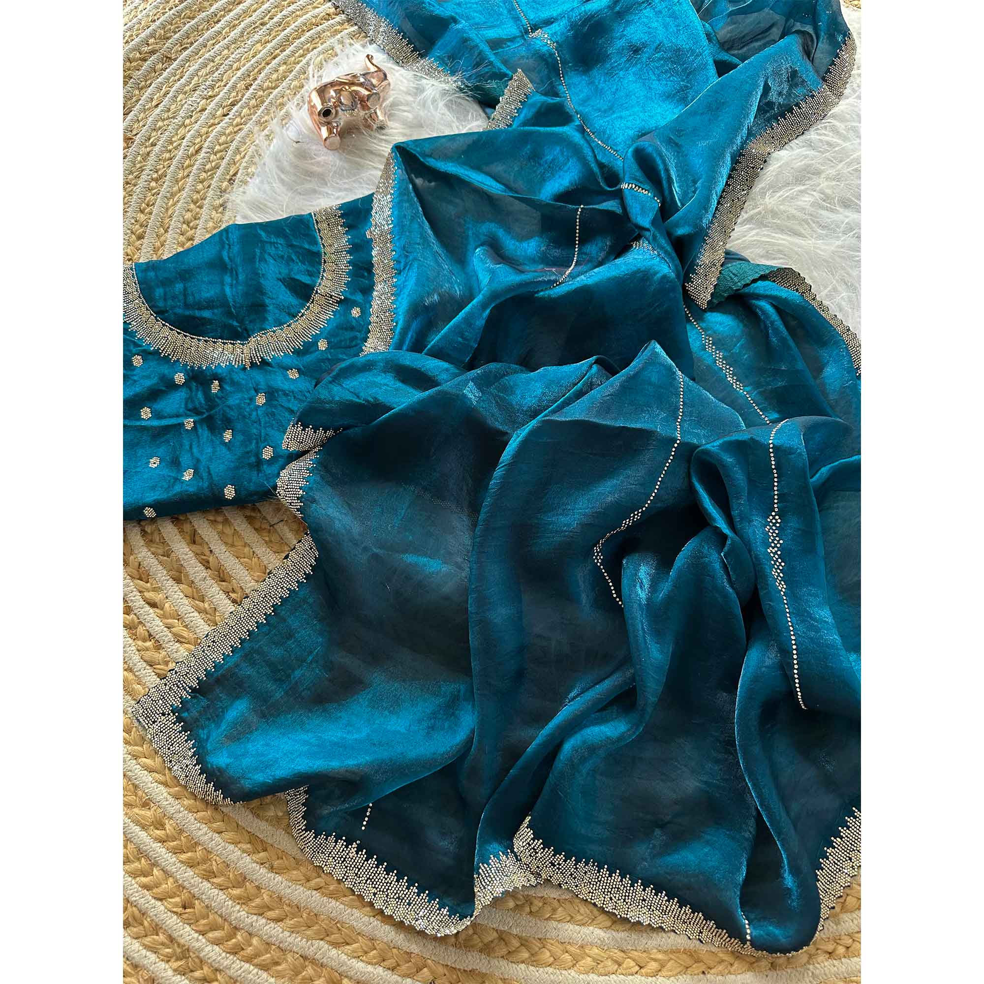 Classic Peacock Blue Pure Silk Saree Adorned With Sparkling Jarkan Work & An Designer Border