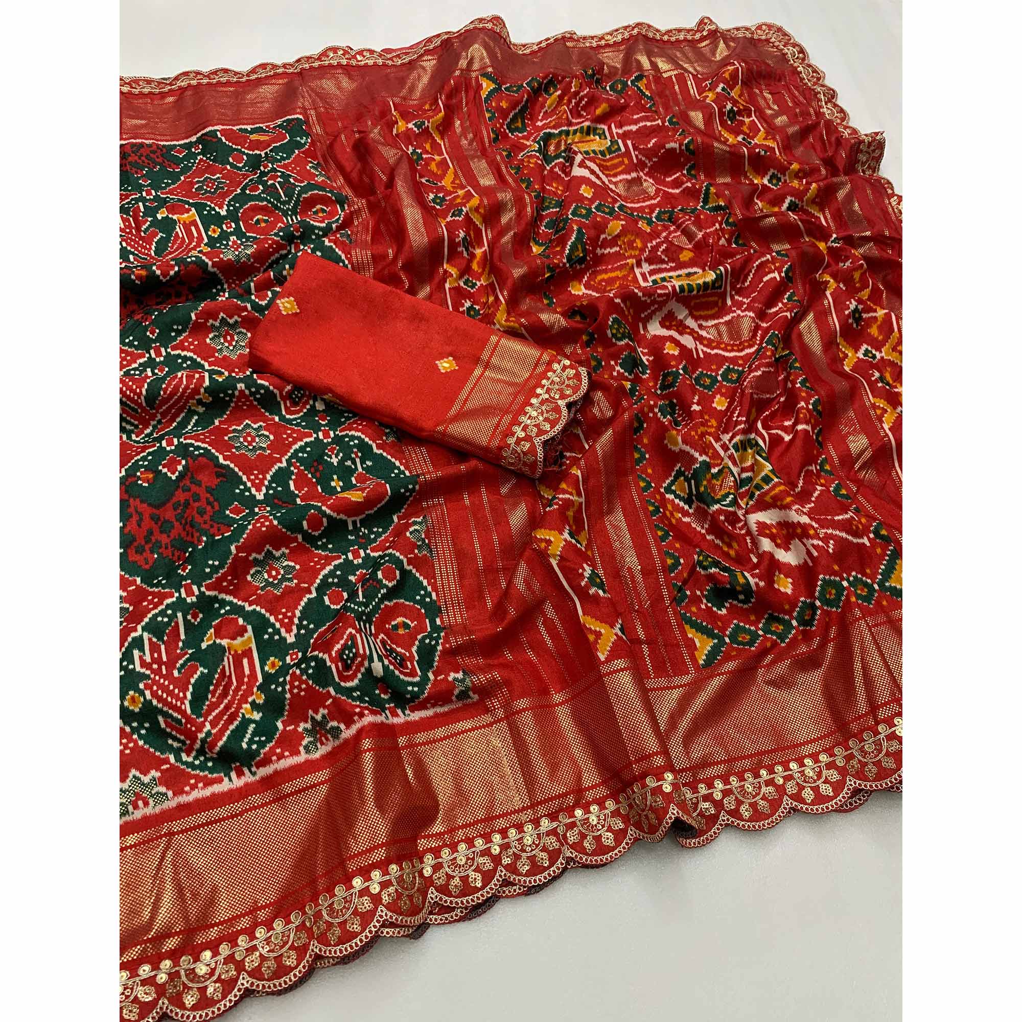 Green & Red Ikkat Printed Dola Silk Saree With Sequins Embroidery Border