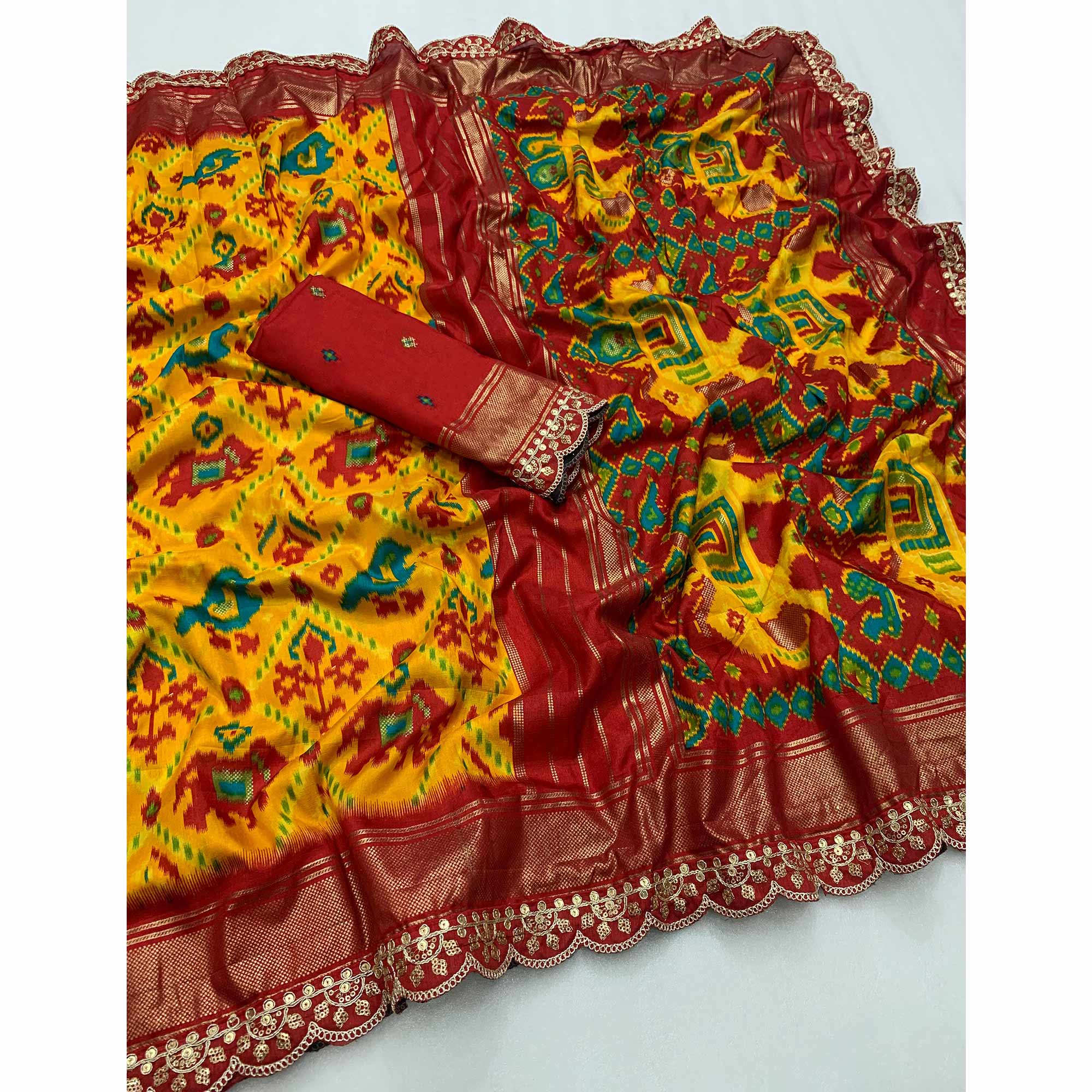 Mustard & Red Ikkat Printed Dola Silk Saree With Sequins Embroidery Border