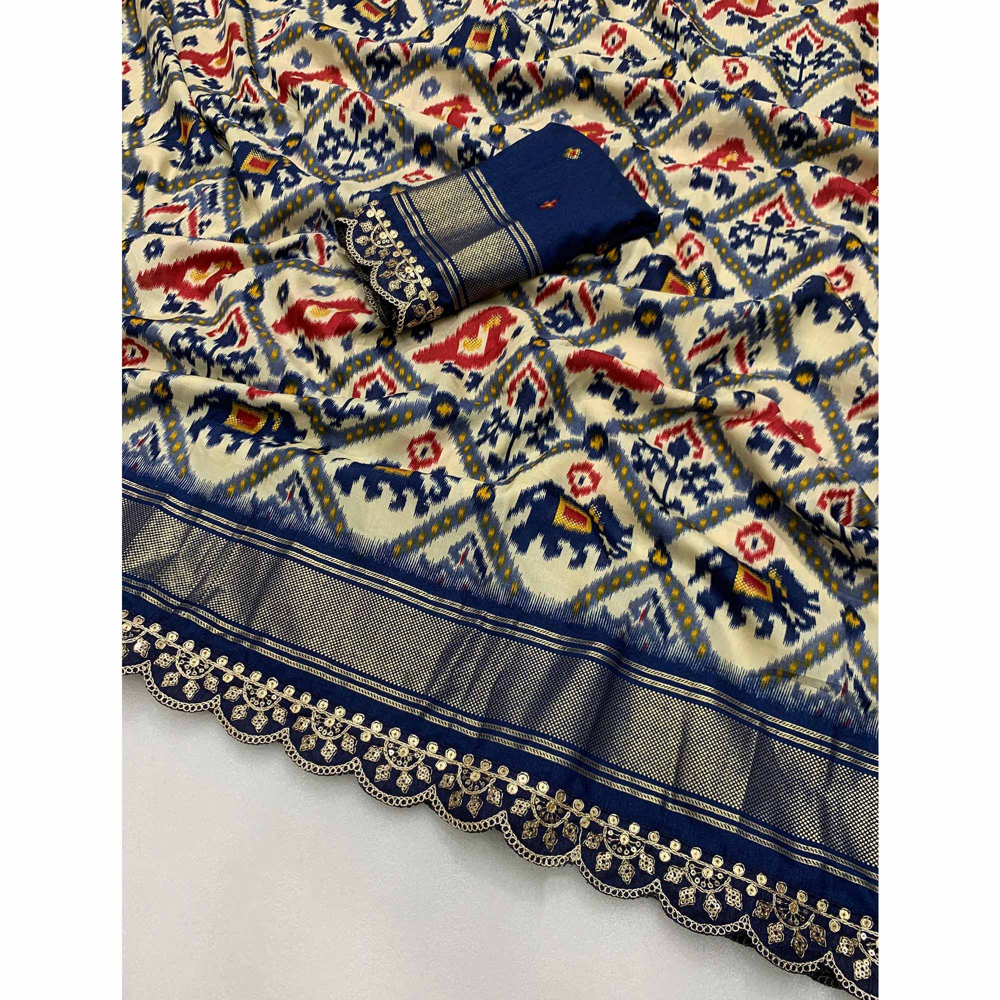 Off White & Blue Ikkat Printed Dola Silk Saree With Sequins Embroidery Border