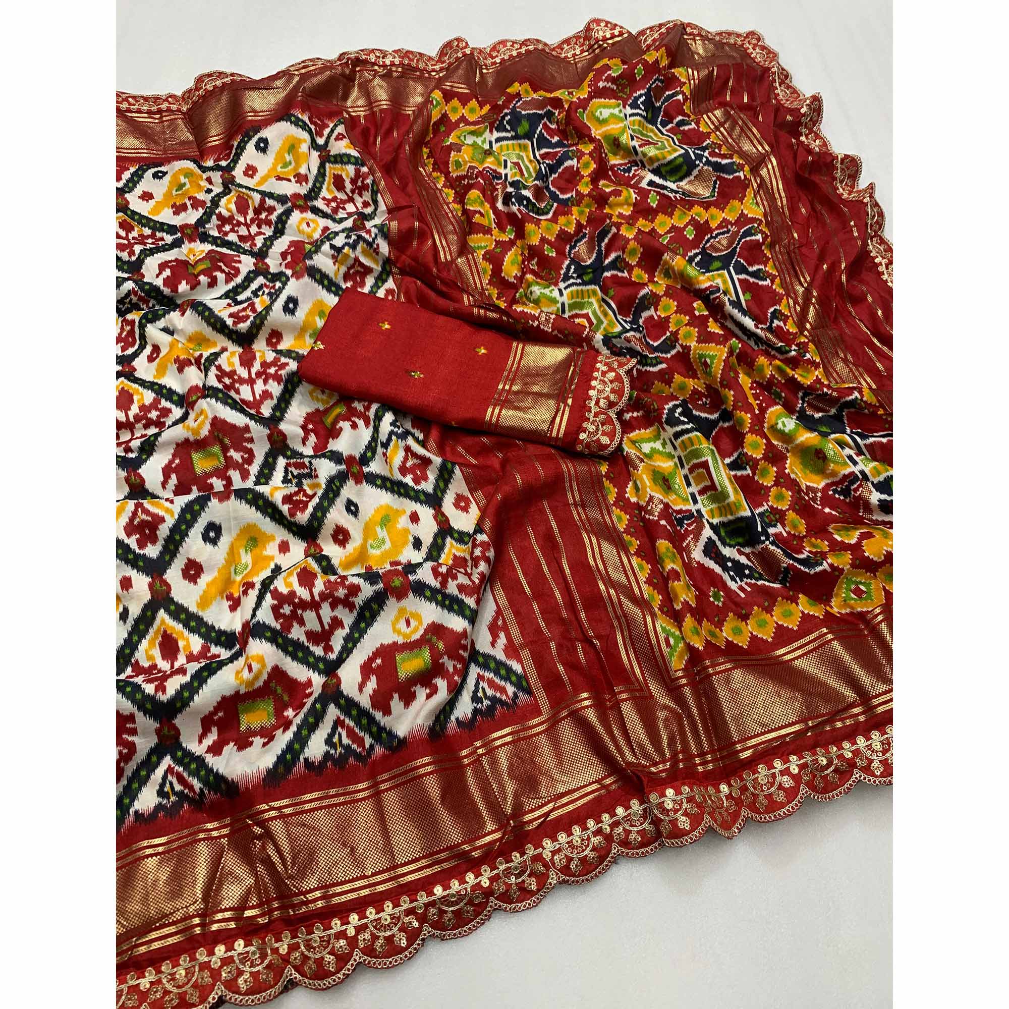 Off White & Red Ikkat Printed Dola Silk Saree With Sequins Embroidery Border