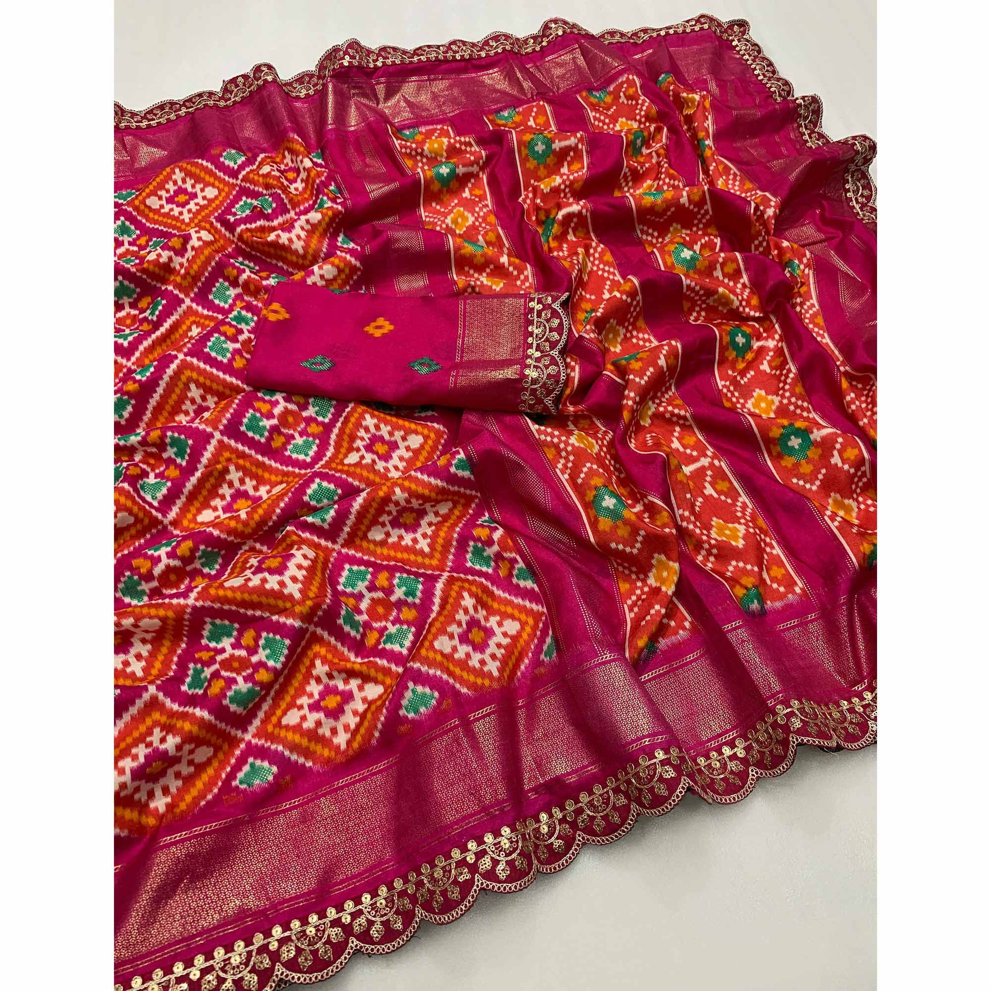 Pink Ikkat Printed Dola Silk Saree With Sequins Embroidery Border