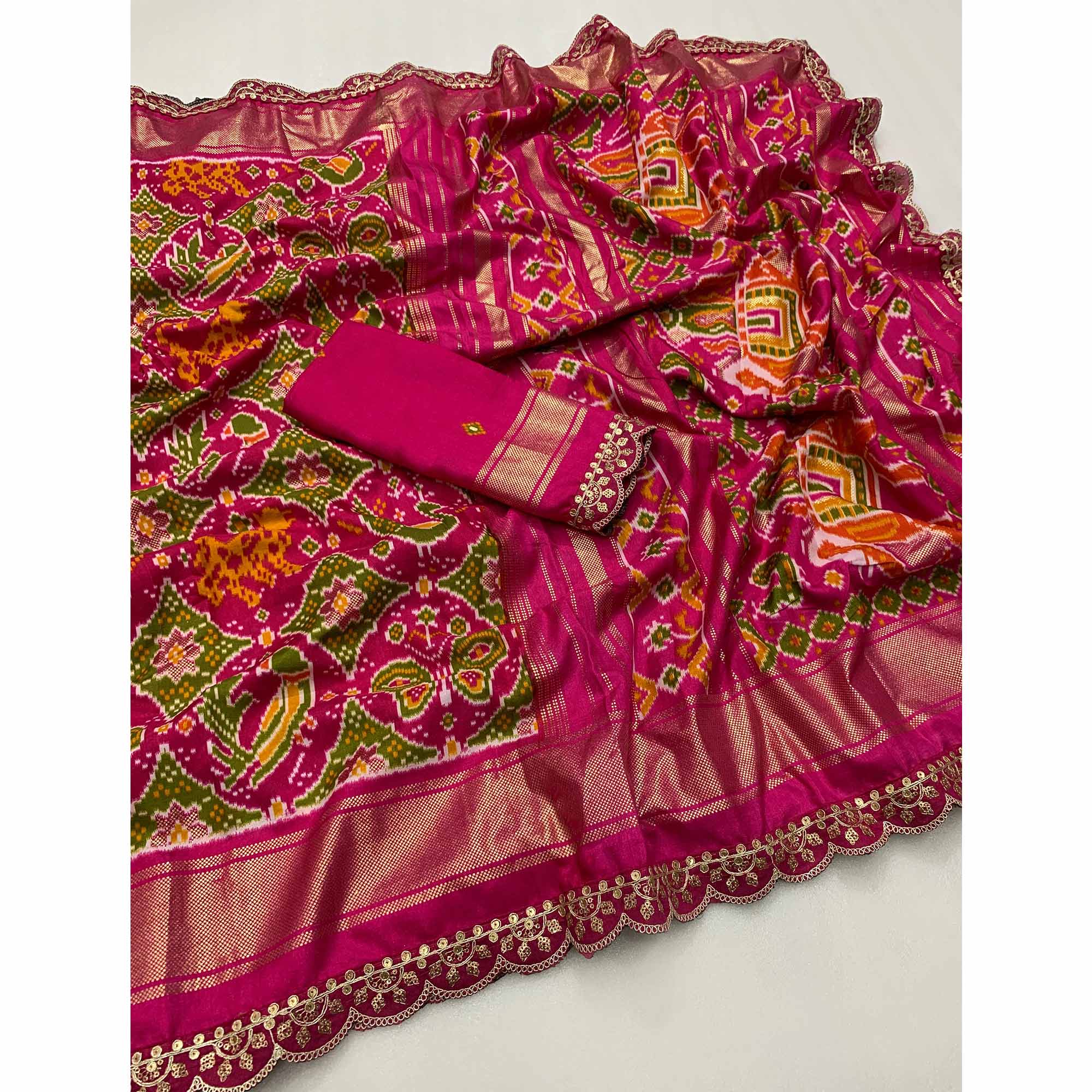 Pink & Green Ikkat Printed Dola Silk Saree With Sequins Embroidery Border