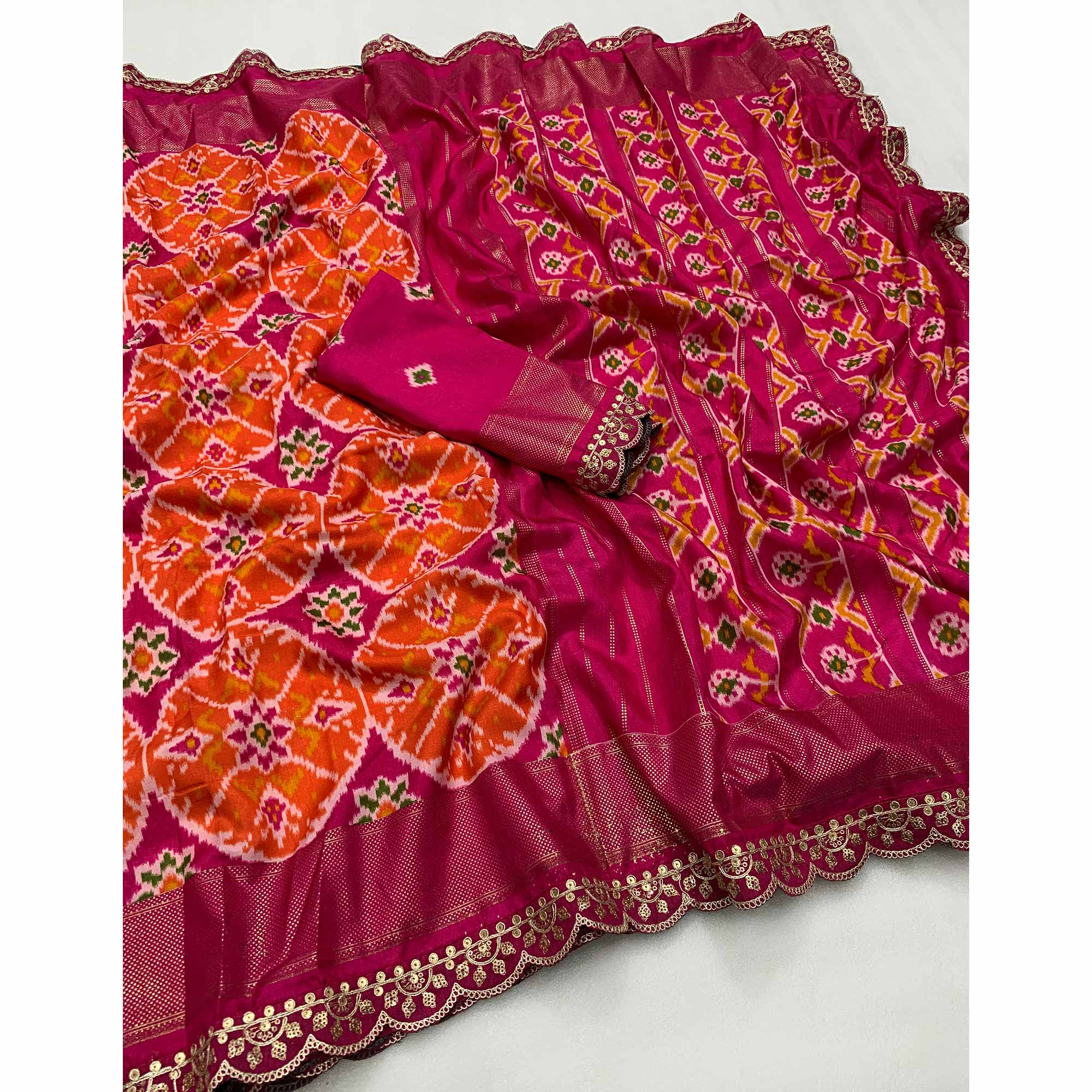 Pink & Orange Ikkat Printed Dola Silk Saree With Sequins Embroidery Border