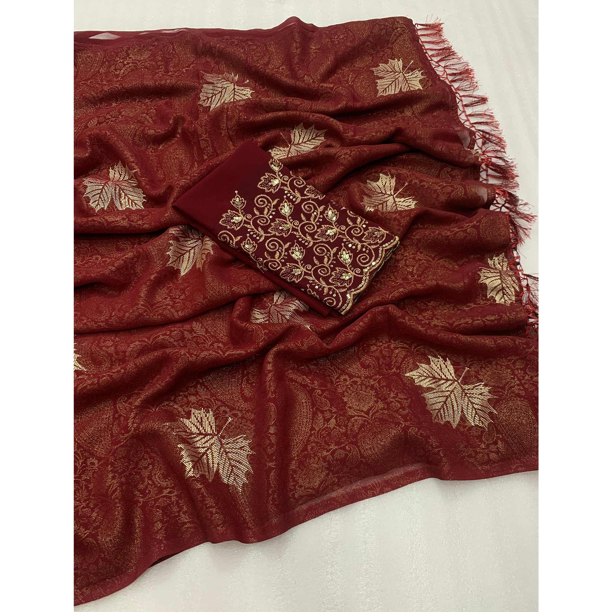 Maroon Foil Printed Georgette Saree With With Tassels