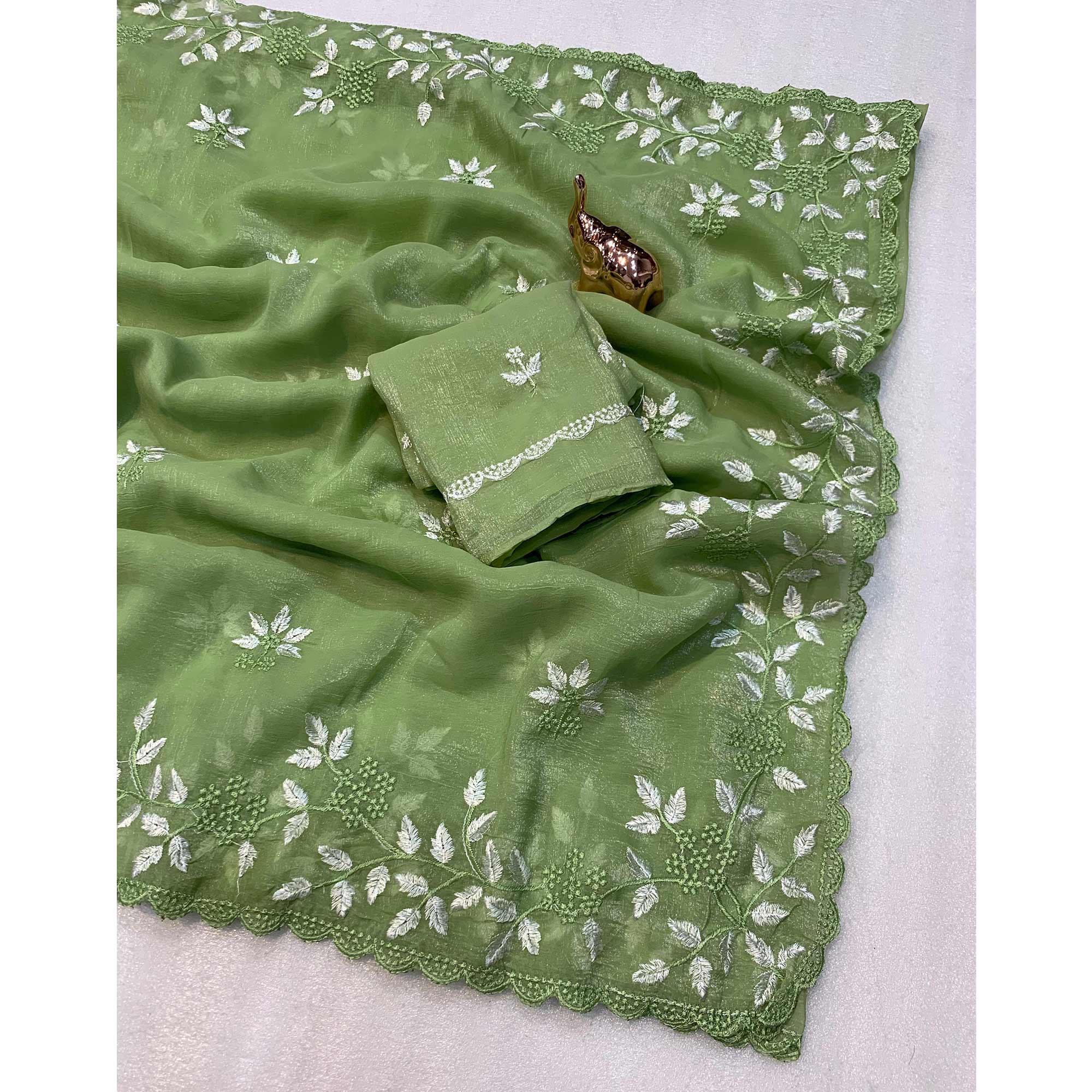 Green Chiffon Saree Adorned With Delicate Floral Thread Embroidery