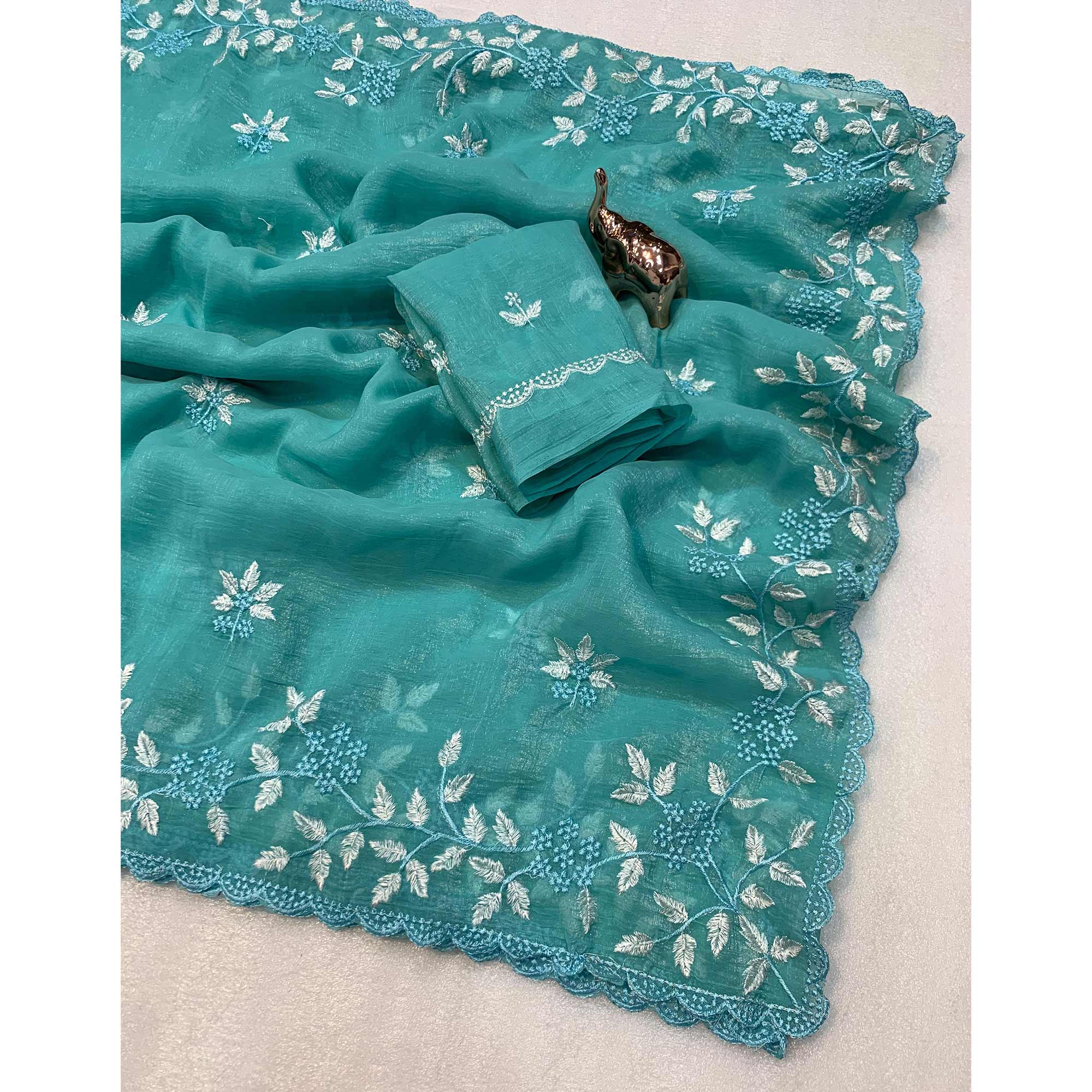 Turquoise  Chiffon Saree Adorned With Delicate Floral Thread Embroidery