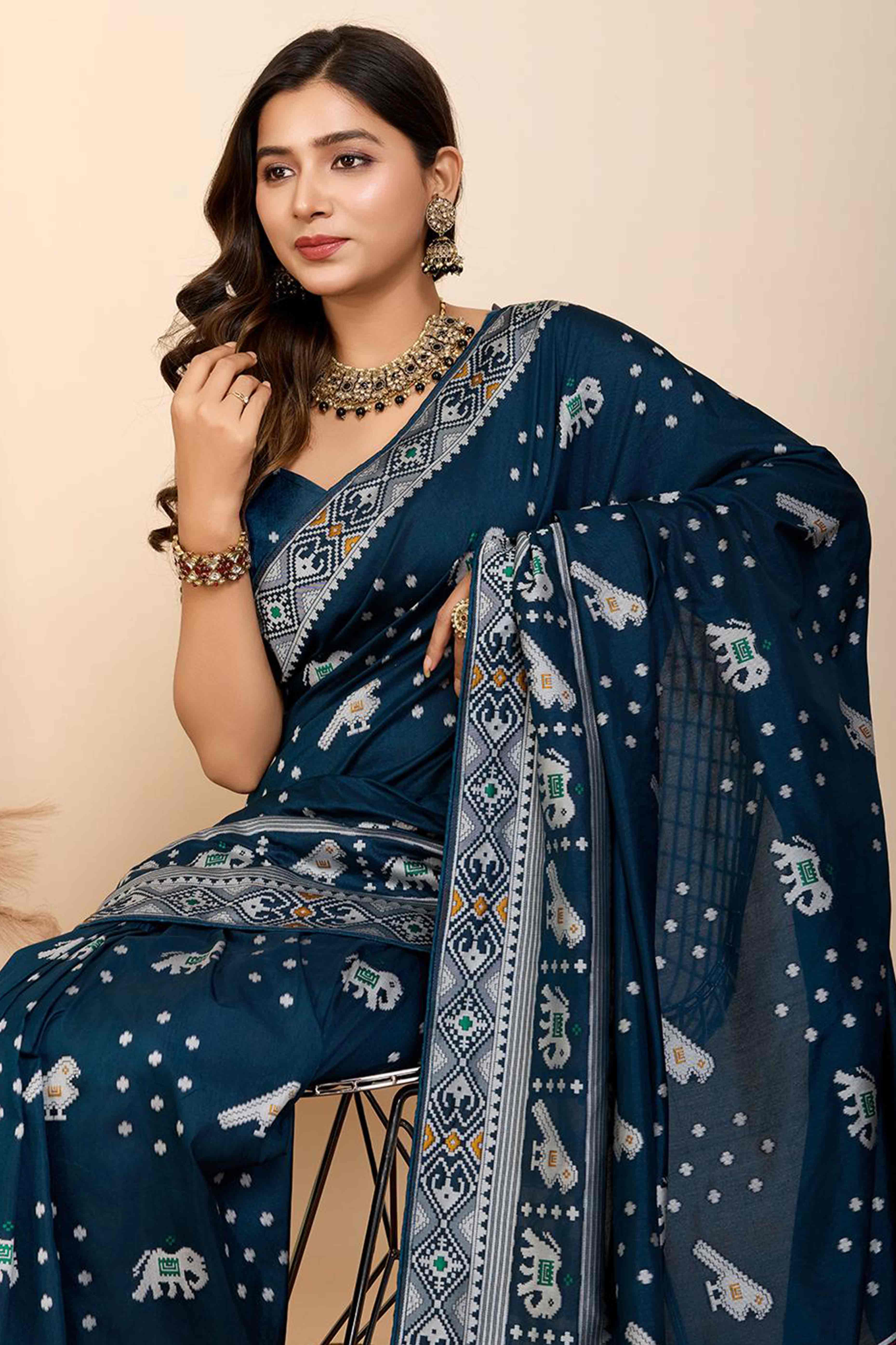 Blue Woven Dola Silk Patola Saree With Tassels