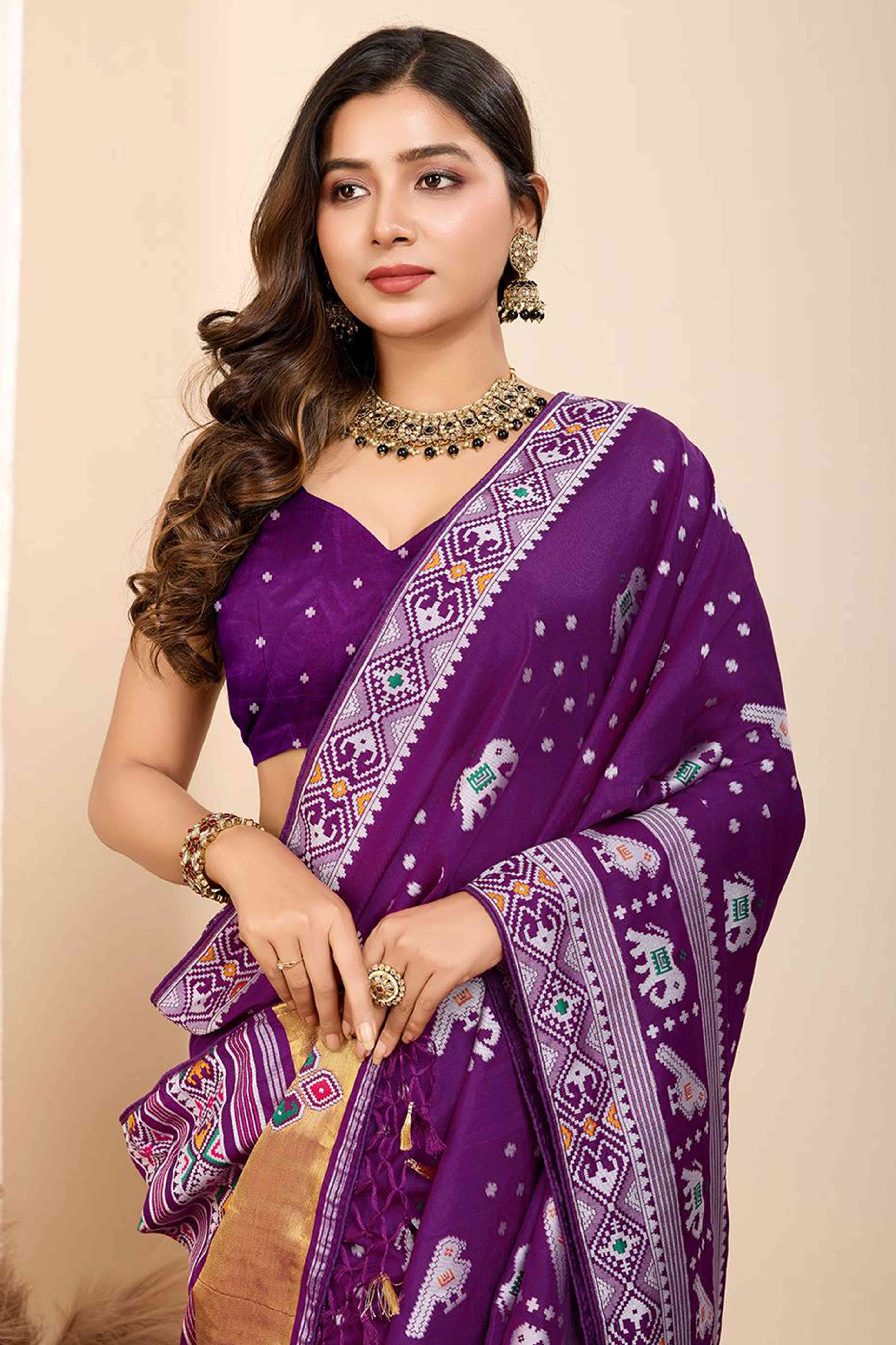 Purple Woven Dola Silk Patola Saree With Tassels