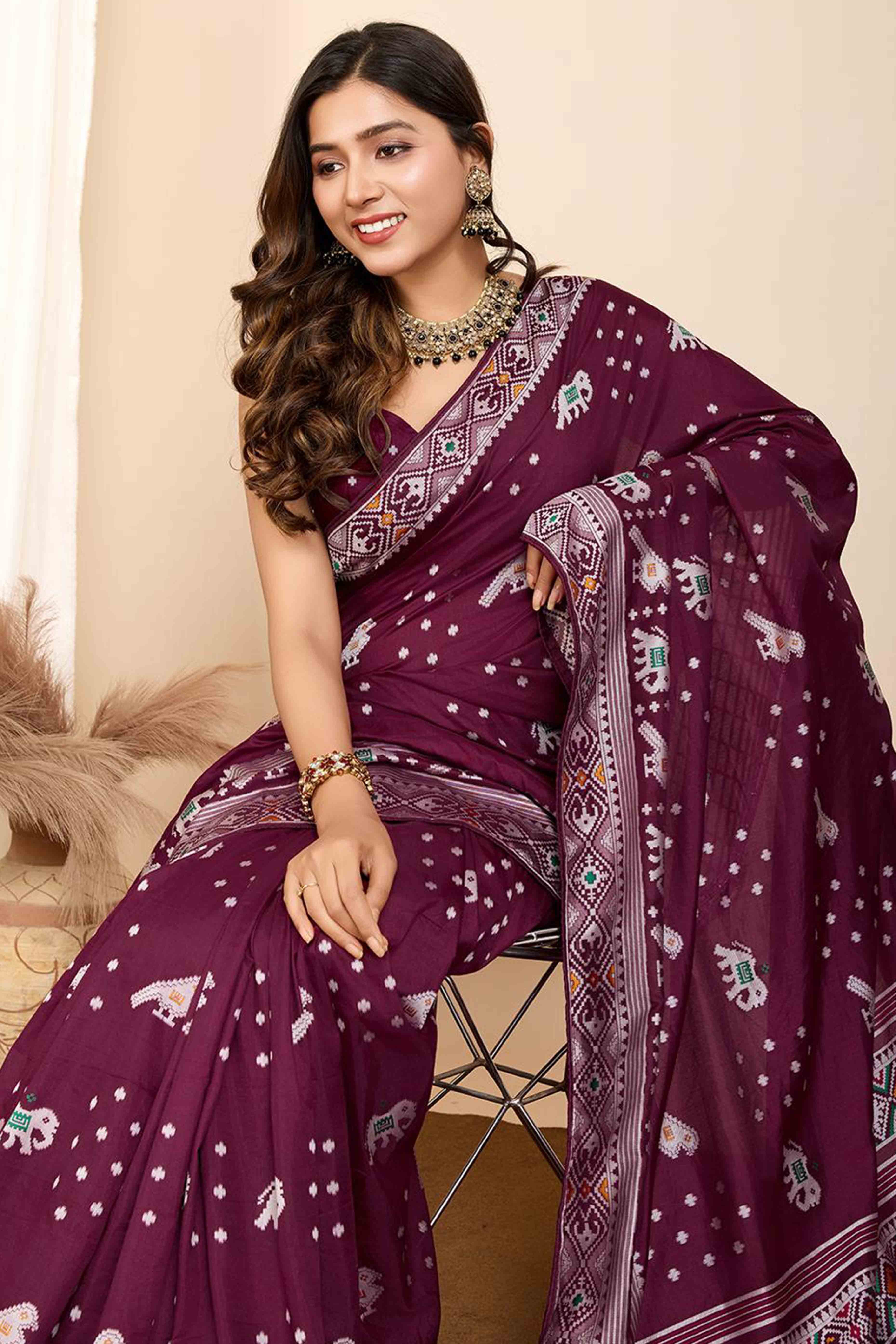 Wine Woven Dola Silk Patola Saree With Tassels