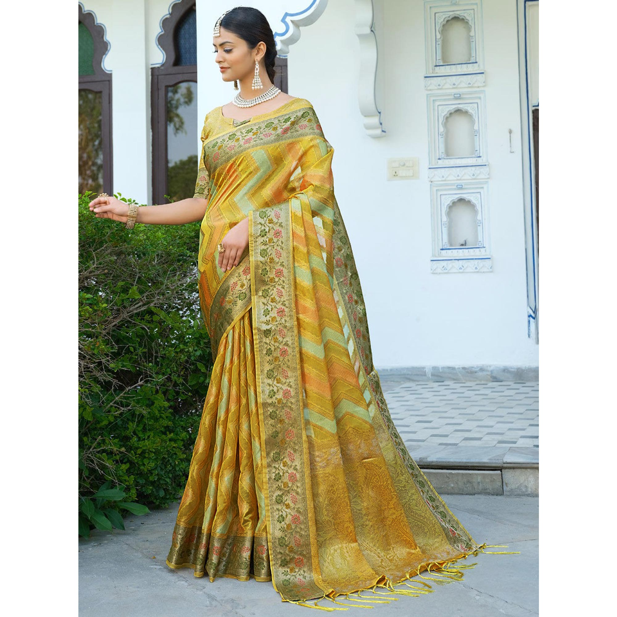 Yellow Woven Organza Saree With Tassels