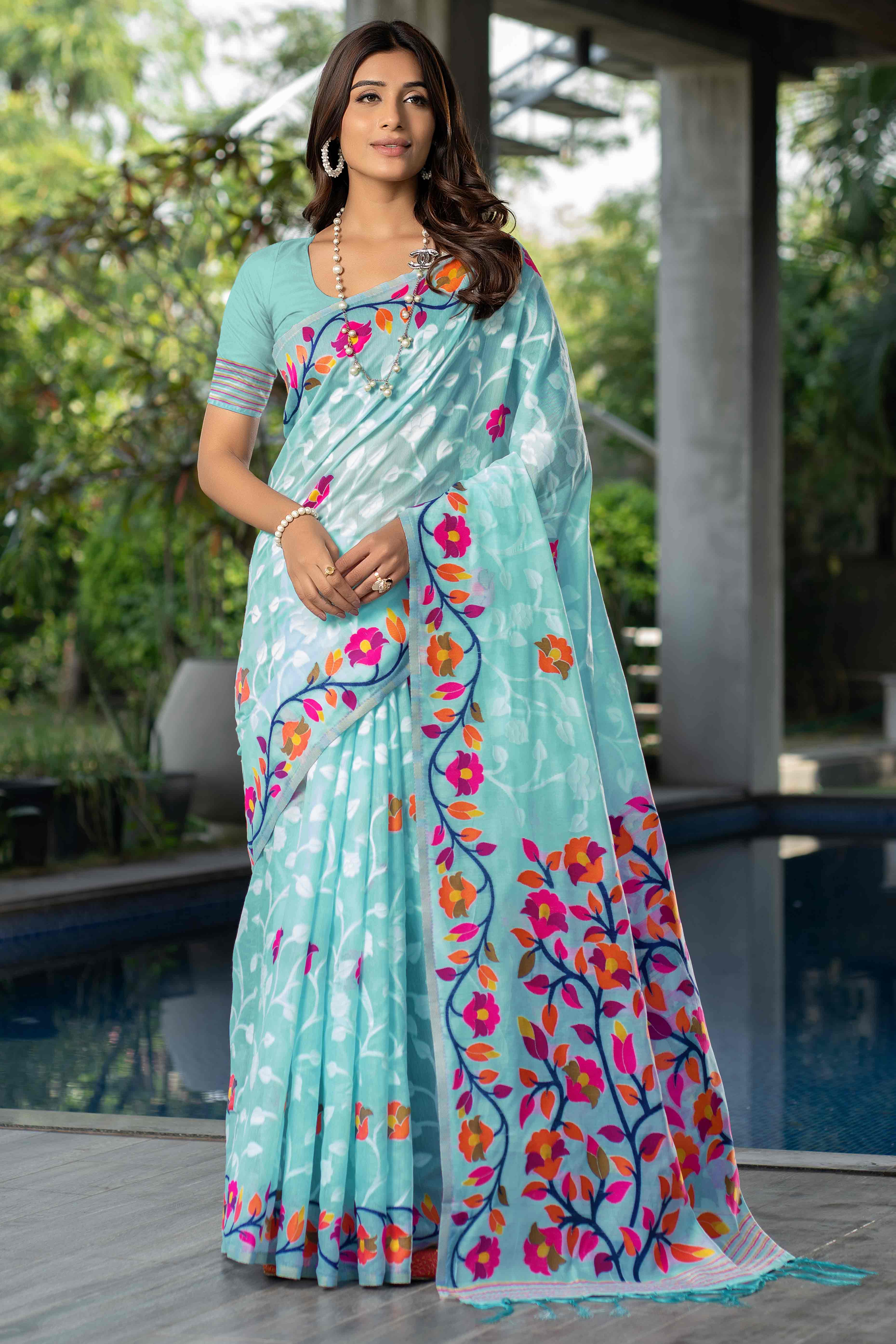 Blue Floral Woven Cotton Jacquard Jamdani Saree With A Graceful Tassel Border