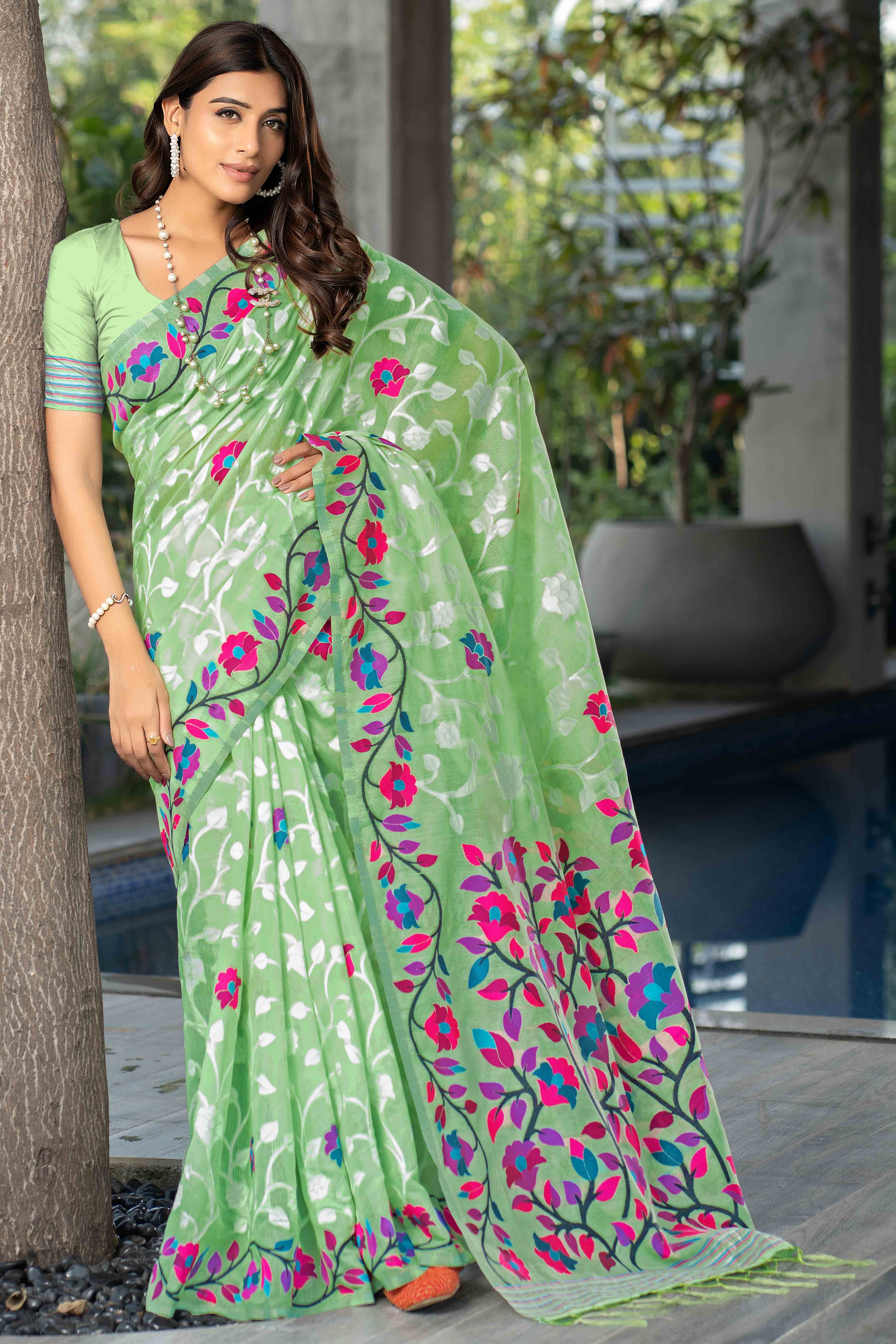 Green Floral Woven Cotton Jacquard Jamdani Saree With A Graceful Tassel Border