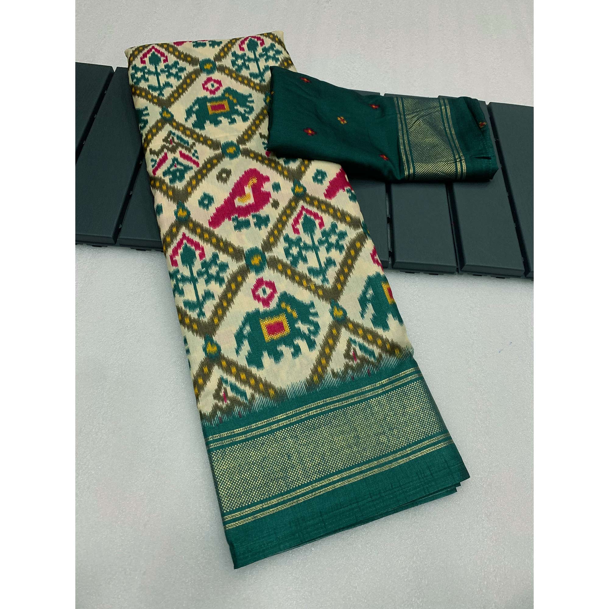 Off White & Green Patola Printed Dola Silk Saree