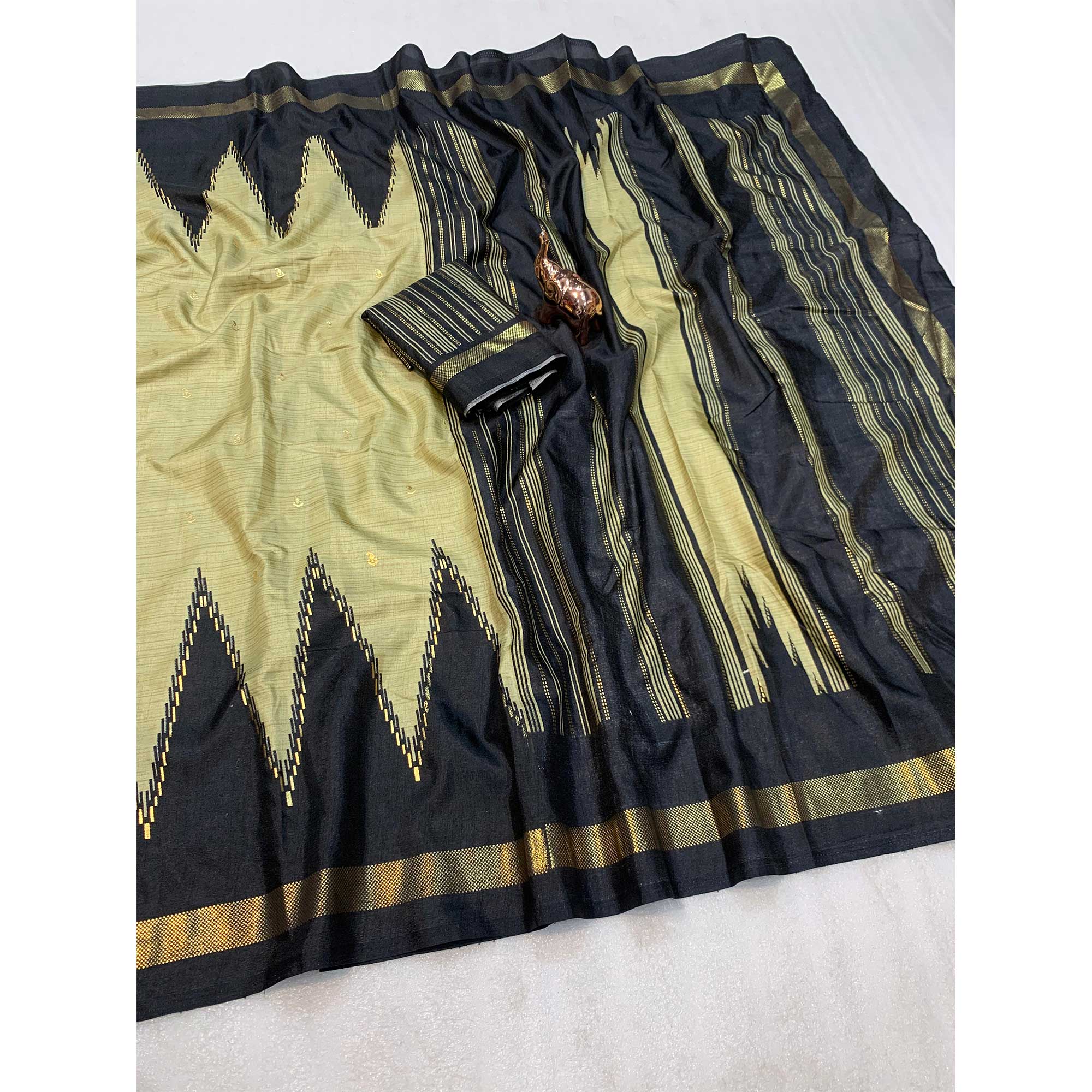 Subtle & Stylish Chikoo Saree With Ikkat Prints In Luxe Dola Silk For Festive Wear